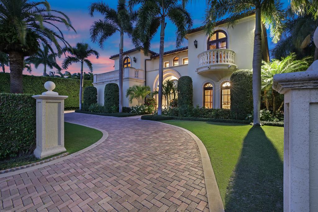 Enjoy the privacy of Everglades Island in this extraordinary 6 bedroom, 8-1/2 bath property with classic elegance and quality craftsmanship. This spacious floor plan with high ceilings, Tischler impact glass French doors, custom fireplace, and beautiful detailed ceilings make this property unique. The peaceful, lushly landscaped backyard overlooks the lake and the golf course making this the perfect setting for relaxing with family or entertaining friends! The large designer kitchen exudes quality with its Viking stainless steel stove, SubZero refrigerator/freezer, beautiful cabinetry and granite center island. Just off the kitchen, is a cozy breakfast area with built in seating for comfort and relaxation while enjoying your morning coffee. A generous sized family room is perfect for watching football and enjoying a casual evening with friends.
As you enter the master suite, you are lulled by the breathtaking views from the upstairs patio. The two master baths and spacious closets, as well as a comfortable seating area make this suite a place to relax and forget it all.
Exclusive to Everglade Island, residents enjoy the added benefit of private night time roaming security.