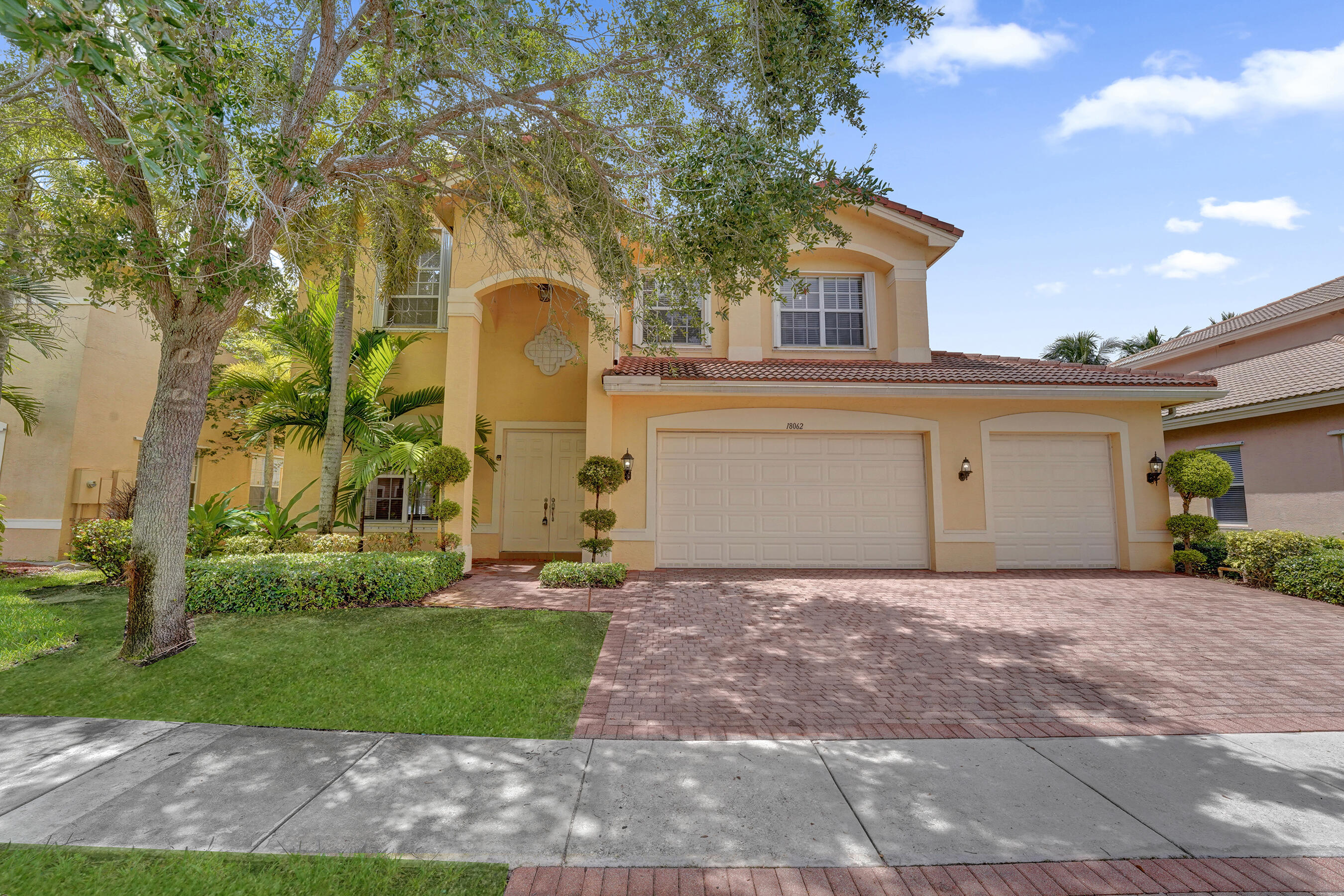 Step into bright, open concept living spaces designed for comfort, style, and easy entertaining in this spotless 5-bedroom, 3-bath lakefront home in gated Sunset Falls. This home was built for entertaining, with spacious flexible living areas perfect for dining, relaxing, working, hosting, or creating the lifestyle space that fits your needs. The kitchen features granite countertops, 42" wood cabinets, stainless steel appliances, double oven, breakfast bar, and ample storage. The generous primary suite offers a bonus sitting area, dual walk-in closets, and a large bath. Enjoy peaceful lake views from the covered patio, complete hurricane protection, and a 3-car garage. Sunset Falls offers resort-style amenities:pool, clubhouse, gym, tennis, basketball, playground, 24-hour guard gate.  Close to excellent schools, shopping, dining, and highways.