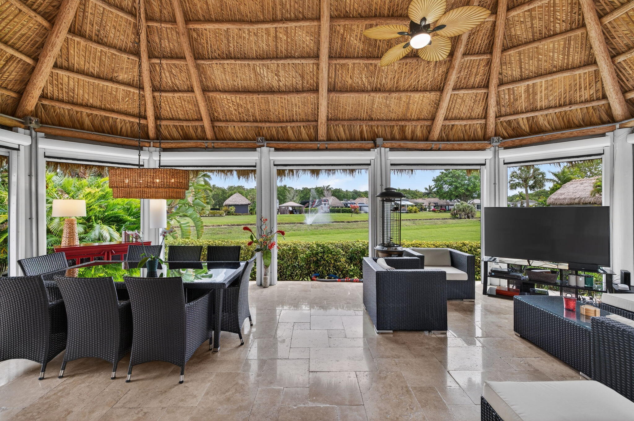 Welcome to this desirable waterfront lots in Aztec Luxury RV Resort! Spanning over 4,850 square feet, this exceptional property offers breathtaking views of the tranquil canal and picturesque fountain, creating the perfect setting to relax and enjoy South Florida's resort lifestyle.  The property includes a charming casita featuring a comfortable sleeping area and a full bathroom with a shower, providing ideal accommodations for guests or additional private space. Offered fully furnished, this meticulously maintained property is truly move-in ready, allowing you to start enjoying the resort from day one.  Whether you're entertaining friends, unwinding by the water, or simply taking in the peaceful views, this lot offers endless possibilities for your luxury motorcoach