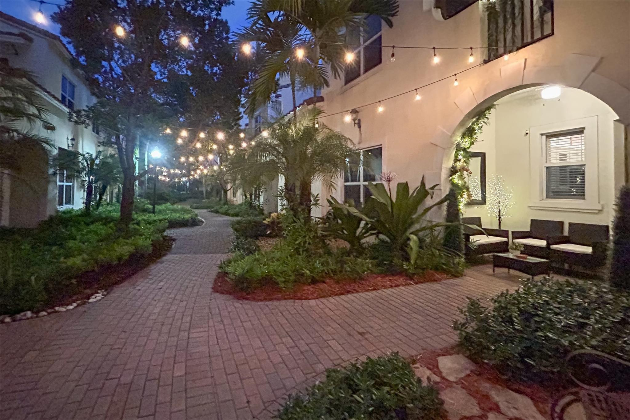 MOTIVATED SELLER! JUST REDUCED - INSTANT EQUITY OPPORTUNITY IN PEMBROKE PINES! Whether you're a first-time buyer, downsizing, or looking for an investment property, this recent price improvement makes now the perfect time to act. Opportunities with immediate equity potential don't stay on the market long. Tenant is currently in place. This 3-bedroom, 2.5-bathroom modern and beautiful town home is in the coveted gated Centra Falls community of Pembroke Falls. The home features high ceilings, a two-car garage, two car driveway, stainless steel kitchen appliances, granite countertops, washer dryer upstairs, hurricane impact windows and doors and a private balcony off the master suite.  The home's main living area features a modern electric fireplace, and there are elegant custom-built ins