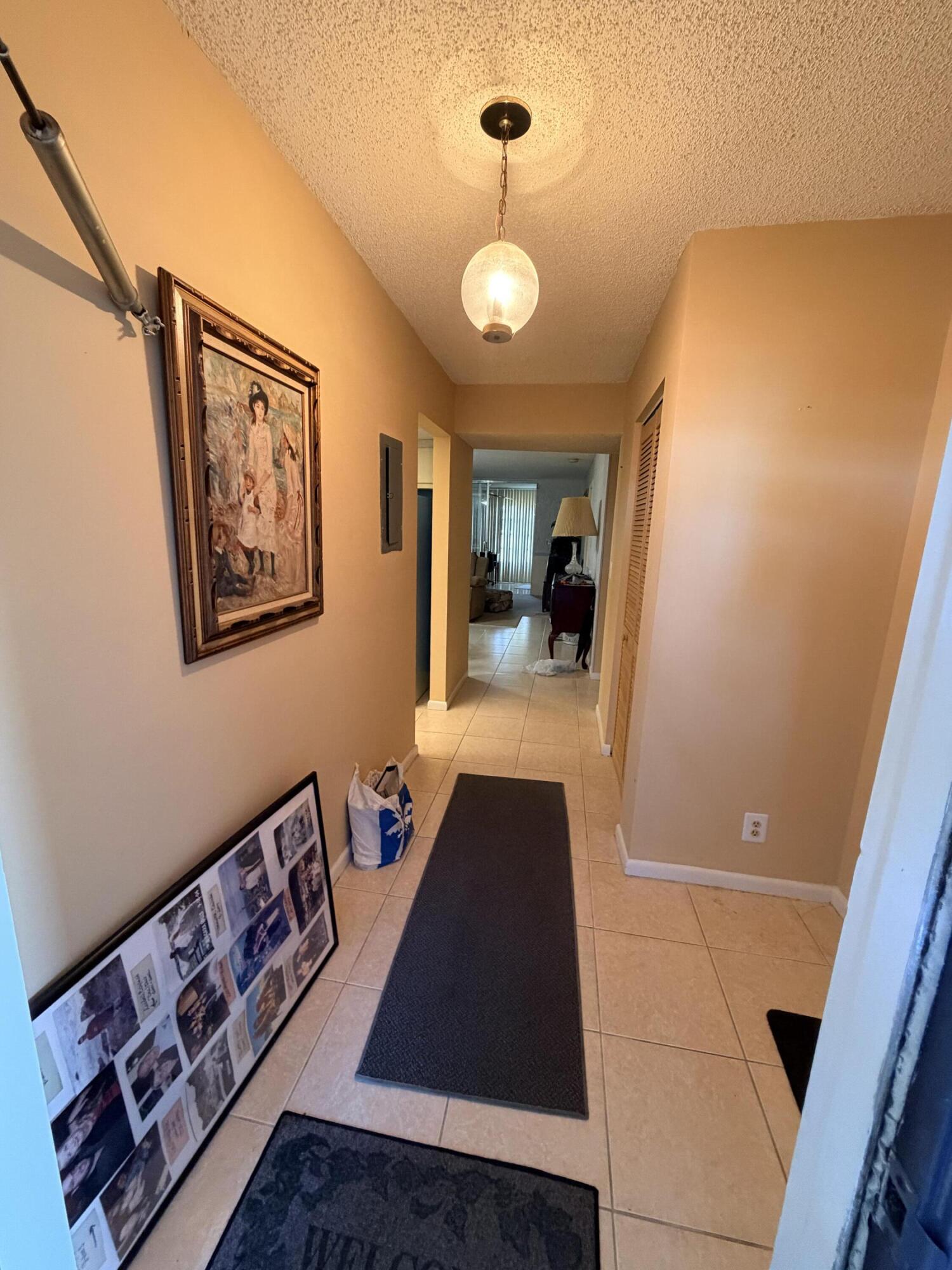 Welcome home to this beautifully maintained 1-bedroom, 2-bath condominium nestled in a picturesque community surrounded by lush golf course fairways and tranquil lake views. This inviting residence features an open floor plan that creates a bright and spacious living area, perfect for both relaxing and entertaining.The oversized bedroom offers generous closet space and comfort, while the well-appointed kitchen provides ample cabinetry and workspace for everyday living. Enjoy your morning coffee or unwind in the evening from the enclosed porch, where you can take in the peaceful surroundings and scenic views.Residents enjoy access to a sparkling community pool and beautifully landscaped grounds, making every day feel like a vacation.