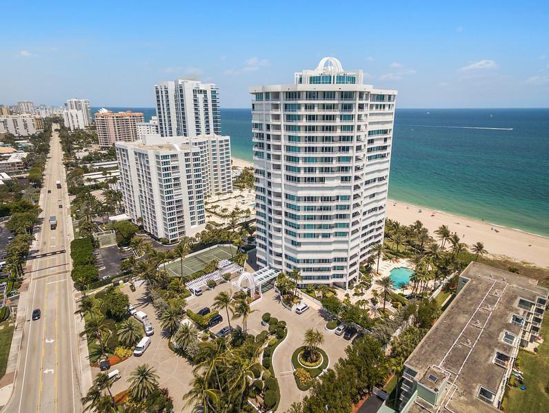 Prepare To Fall in Love with this Completely Renovated New Construction NE Corner of the Cristelle.  Sweeping Ocean Views from the Living area and Primary Bedroom.  800 SQ FT of Covered Balcony Space offering oceanviews to the East and Intracoastal views to the West.  New Hurricane Shutters installed on the Patio in 2026. This Tastefully Renovated unit offers an open floor plan with 4x4 Porcelain Tiles throughout. Back Lit Built-in Bar Unit in Living Area, open eat in  kitchen with modern cabinetry new Appliances & A/C Units . Full walk in Laundry room.  3 fully renovated baths.  Primary Suite offers a Soaking Tub , Double Sinks, private Commode room and walk in Shower.  Abundant closet space.  Impact windows and sliders all accessible for ease of cleaning.  Move in Ready Unit.