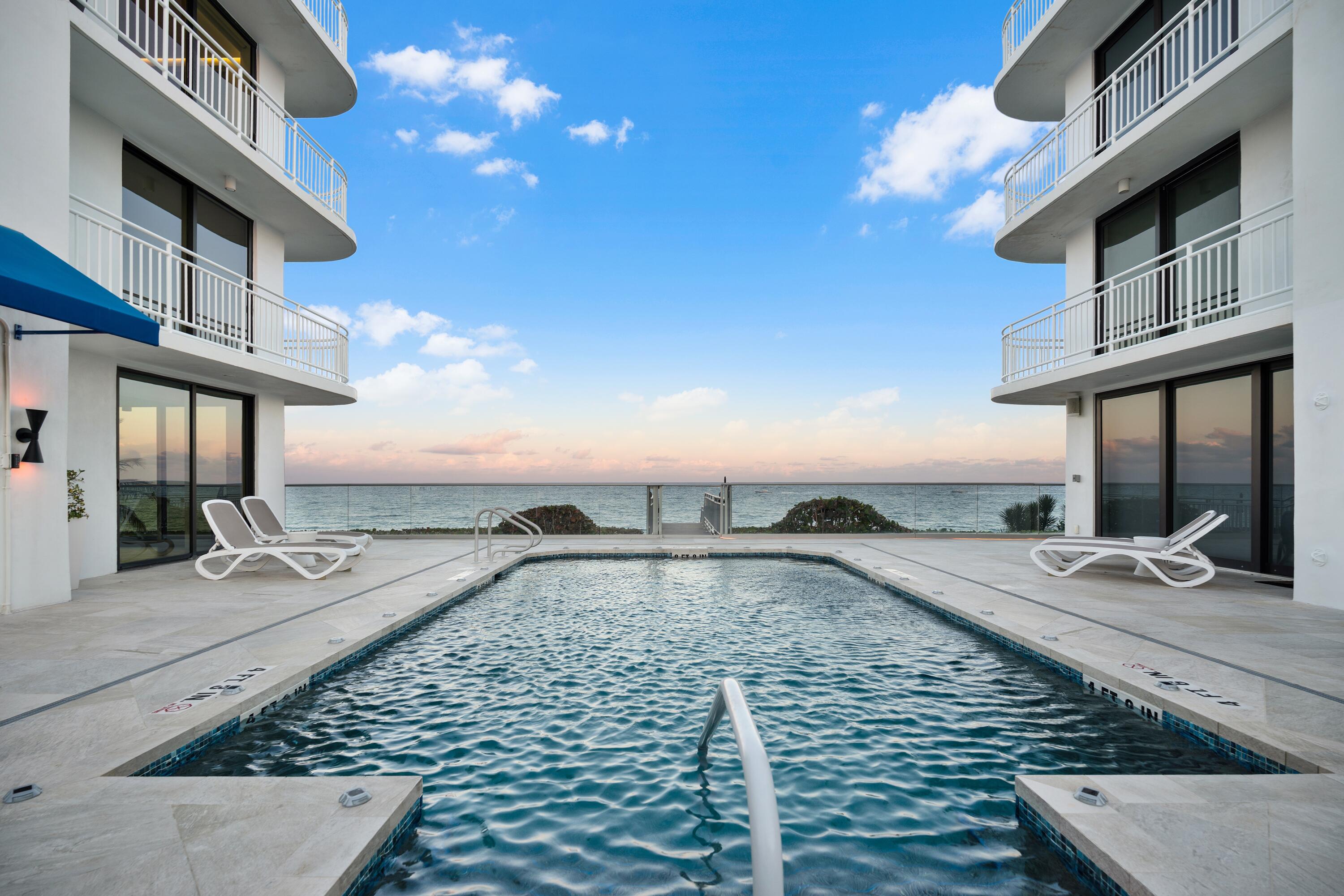 One-of-a-kind panoramic oceanfront residence with breathtaking views from every room. Entire fourth-floor home sits in an exclusive boutique building. Only four residences per building, offering rare privacy & serene north-side exposure overlooking a peaceful natural area.
Refined chef's kitchen designed for elevated entertaining, featuring an expansive island, premium Miele appliances, wine fridge, & beverage fridge. Impact windows & doors with automated shades.
Relax on what feels like your own private beach & enjoy a tranquil oceanfront pool just steps away. Located minutes from Mizner Park's shopping and fine dining, a short drive to downtown Delray Beach, & near the brand new Life Time fitness club!
*HOA dues scheduled to decrease in 2 years, with an additional reduction in year 3.