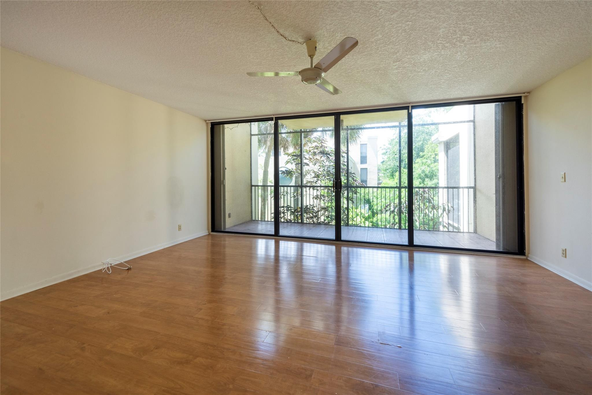 Welcome to this thoughtfully designed two-bedroom, two-and-a-half-bath condominium in the Harvest Section One community in Davie, Florida. This two-story residence offers 1,230 square feet of finished living space, providing comfortable accommodations and functional layouts. The well-appointed floor plan features multiple bathrooms for added convenience and practicality. Located in Davie, this condo presents an opportunity for those seeking a well-constructed residential property in an established community. Whether you're looking to invest or establish your residence, this unit offers solid fundamentals and a practical living arrangement. 5 minutes from Nova Southeastern University and in A Rated school district for your younger kids. *Photos to be updated Sellers installed new flooring.