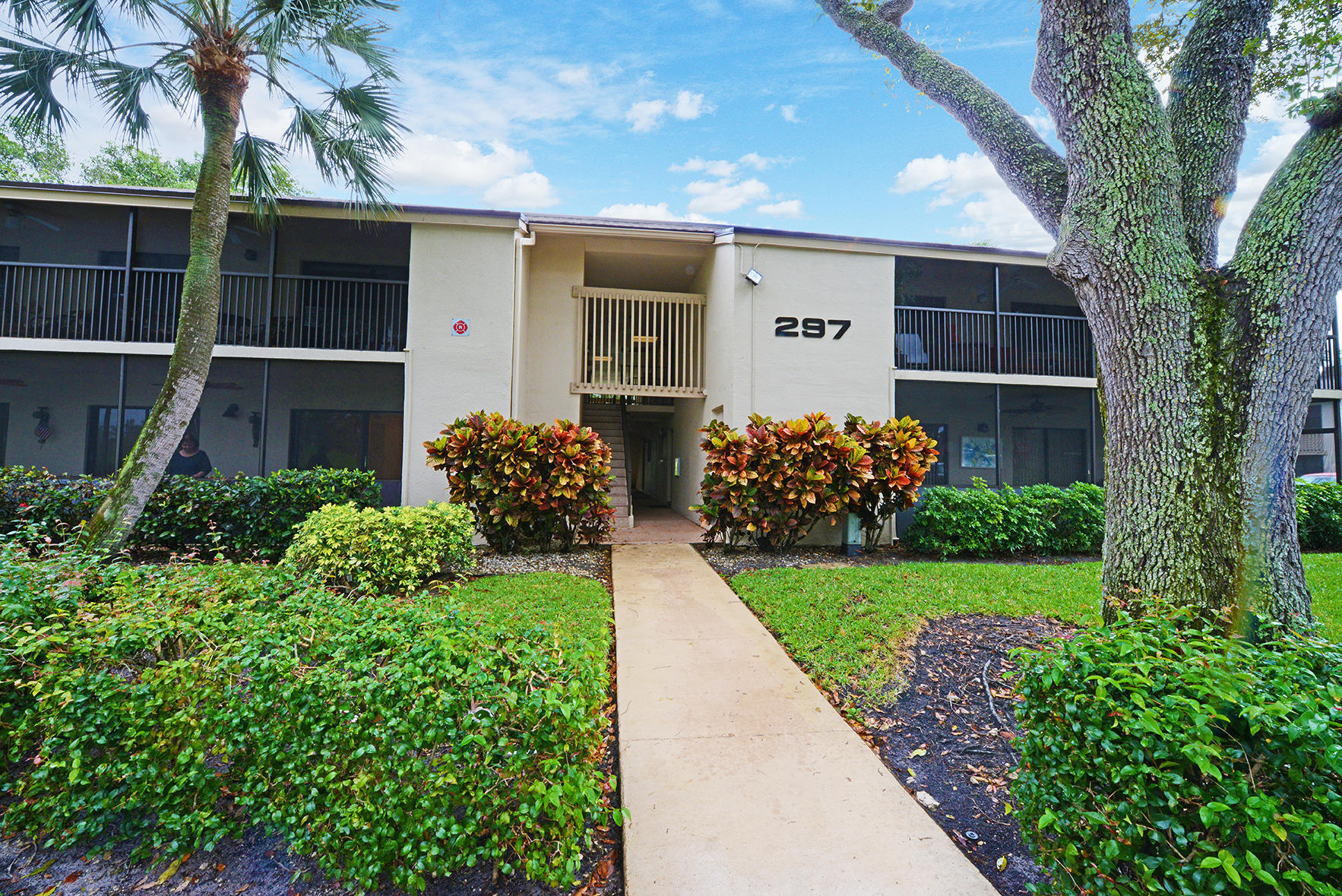 Bright corner unit with tons of natural light and large spacious screened-in patio! No elevators and no stairs to climb! This gorgeous 2 bedroom, 2 bath unit with tile floors throughout and features a recently updated modern kitchen with granite counter tops, new stainless-steel appliances, new modern bathrooms with new vanities and white quartz counter tops. Community amenities and pool within walking distance! Excellent landlord-friendly community; Owner's may lease to tenant's up to 12 times per year!