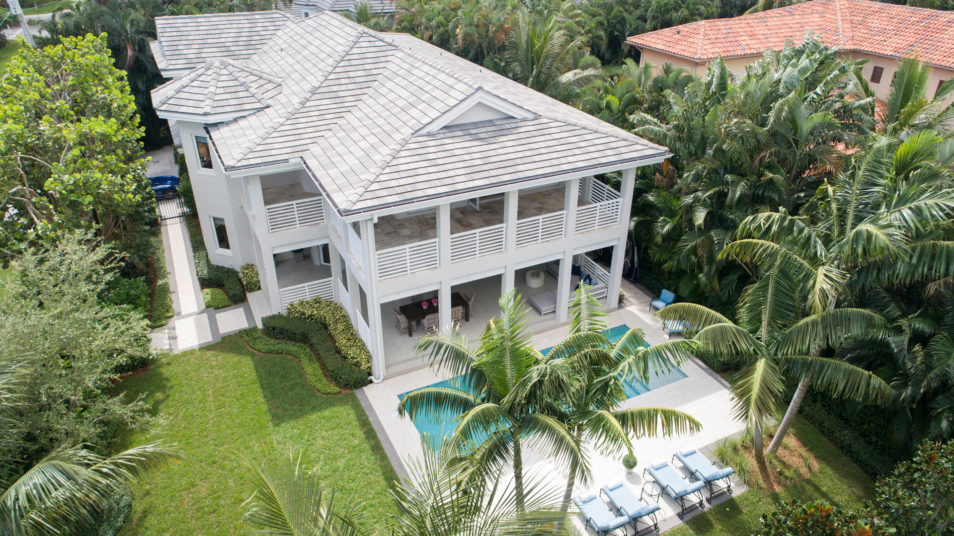 Recent top-to-bottom designer renovation of this Florida Modern estate offers chic style and effortless functionality for indoor/outdoor living in a desirable beachside neighborhood. Clean-lined elegance takes on a fresh natural feel in the striking but understated interiors with light-tone oak plank floors. French doors open to 2-story verandas by the sleek pool terrace backed by lush landscaping. The information herein is deemed reliable and subject to errors, omissions or changes without notice.  The information has been derived from architectural plans or county records. Buyer should verify all measurements. Location
Seasage Drive, Delray Beach, Florida.  Seagate offers lush Old Florida beauty in a sought-after beachside neighborhood only about a mile south of famous Atlantic Avenue's boutiques and bistros.

Property
Chic aesthetics and effortless functionality come together in this Florida Modern estate's new top-to-bottom renovation by high-end builder Seagate Construction and award-winning Leighton Design Group.  Creatively laid out on the corner site, this stylish residence invites indoor/outdoor living with verandas opening off almost every room.  Two-story verandas overlook the sleek pool terrace backed by lush landscaping.

Residence
Clean-lined elegance takes on a fresh natural feel in the striking but understated living environment encompassing a spacious total of 6,598± square feet with high-end finishes, four bedrooms, four and a-half baths, and a two-bay garage with lift.  Light-toned wide-plank oak floors carry through both levels.  Special features include the all-new systems, impact-glass windows, and concrete tile roof.

Entered from the two-story octagonal foyer, across from the loft-style staircase, the large great room is a light and airy gathering space which opens its doors to the poolside veranda and garden.  Leading to another veranda from a window-lined bay, the inviting dining room is open to the stunning high-style kitchen with Caesarstone counters and contrasting cabinet finishes of white lacquer and beautifully grained hardwood.  Chef's appliances include the Wolf gas range, Sub-Zero refrigerator, and Asko dishwasher.  Opening to a private veranda, the den/office has an en-suite full bath.  Upstairs, the serene and spacious master suite is lined with French doors to a breezy wraparound veranda above the pool and garden.  Two walk-in closets are paired with the suite's spa-like marble bath featuring a sculpted soaking tub and glassed shower.  Verandas also open off the three other bedrooms, one with an en-suite bath and two with a connecting bath.

DISCLAIMER: Information published or otherwise provided by the listing company and its representatives including but not limited to prices, measurements, square footages, lot sizes, calculations and statistics are deemed reliable but are not guaranteed and are subject to errors, omissions or changes without notice. All such information should be independently verified by any prospective purchaser or seller. Parties should perform their own due diligence to verify such information prior to a sale or listing. Listing company expressly disclaims any warranty or representation regarding such information. Prices published are either list price, sold price, and/or last asking price. The listing company participates in the Multiple Listing Service and IDX. The properties published as listed and sold are not necessarily exclusive to listing company and may be listed or have sold with other members of the Multiple Listing Service. Transactions where listing company represented both buyers and sellers are calculated as two sales. The listing company's marketplace is all of the following: Vero Beach, Town of Orchid, Indian River Shores, Town of Palm Beach, West Palm Beach, Manalapan Beach, Point Manalapan, Hypoluxo Island, Ocean Ridge, Gulf Stream, Delray Beach, Highland Beach, Boca Raton, East Deerfield Beach, Hillsboro Beach, Hillsboro Shores, East Pompano Beach, Lighthouse Point, Sea Ranch Lakes and Fort Lauderdale. Cooperating brokers are advised that in the event of a Buyer default, no commission will be paid to a cooperating Broker on the Deposits retained by the Seller. No commissions are paid to any cooperating broker until title passes or upon actual commencement of a lease. Some affiliations may not be applicable to certain geographic areas. If your property is currently listed with another broker, please disregard any solicitation for services. Copyright 2020 listing company All Rights Reserved.