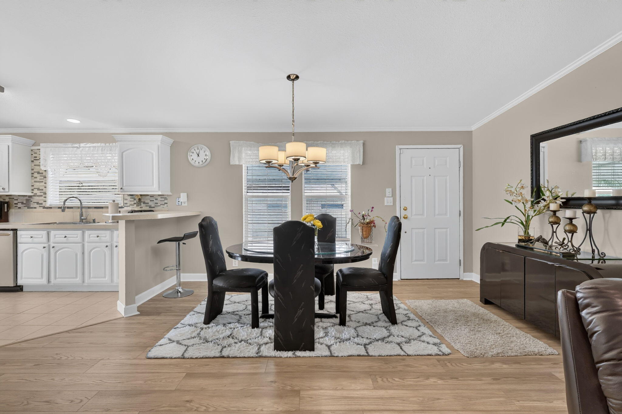 Gorgeous & Durable is this Furnished, 3 Bed/2 Bath home w/ LARGE Shed! Designated Pet lot w/ Yard Space perfect for pets. Shingle ROOF SEALED in 2022 & WaterHtr 2015. Step through the 2019 Storm Door & beauty continues w/ 2025 Floors, SS Appliances & Fridge w/ iceMaker. Brightly lit Kitchen w/ Window Seat Cafe Style Nook, Eat-in Bar & Ample Storage & Counter Space! Master Bed offers a large Ensuite w/ sit down Vanity & abundant Closet Space. PRIME LOCATION: near Beach (NO FLOOD ZONE), Grocery,Shopping, Mall, Postal, Banks, Pharmacy, Hospital & more. Lot Lease 957.72 includes Security,Cafe,Clubhouse w/activities,Lawn care,Trash, Free Private Golf, Heated Pool, Pickleball/Tennis,Shuffleboard, Bocce, Gym,Library, Cards, Mahjong, Bingo,Clubs & more!
