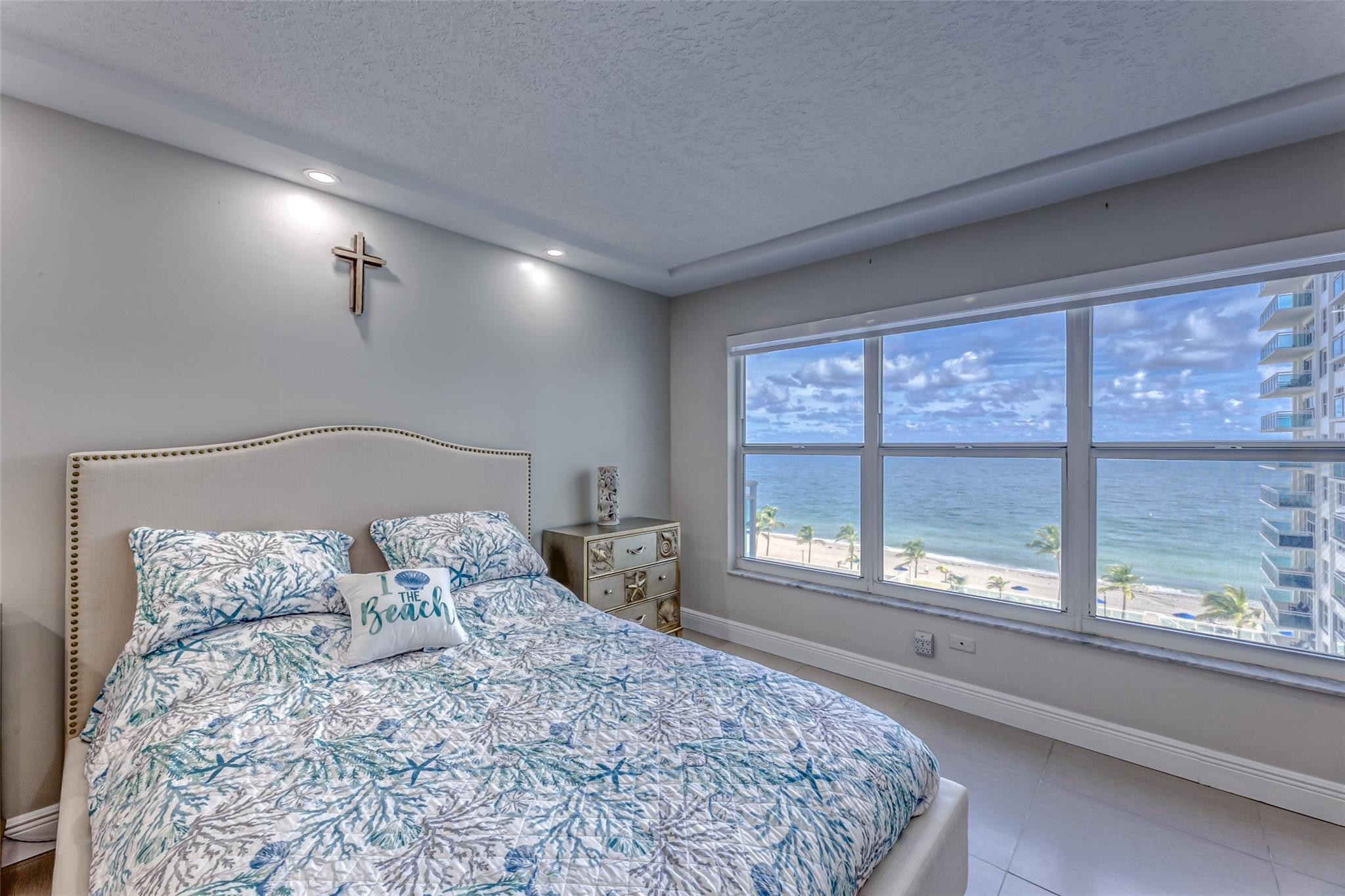 Escape to a beachfront paradise in this stunning 2/2 condo located in the Galt Ocean Mile. It offers breathtaking ocean views facing East. Recently renovated. In-unit washer and dryer. Two garage parking spaces. The split layout of the bedrooms ensures privacy and flexibility. The building has a heated infinity pool with a spacious upper deck, ideal for relaxation. A large BBQ area on the lower deck is perfect for hosting gatherings. Additional amenities include billiard and card game rooms, a movie room, a fully equipped gym, and a community room for private events etc. Grocery stores, dry cleaners, restaurants, and bars are within walking distance, providing ultimate convenience. The airport is just a 15-minute drive away.