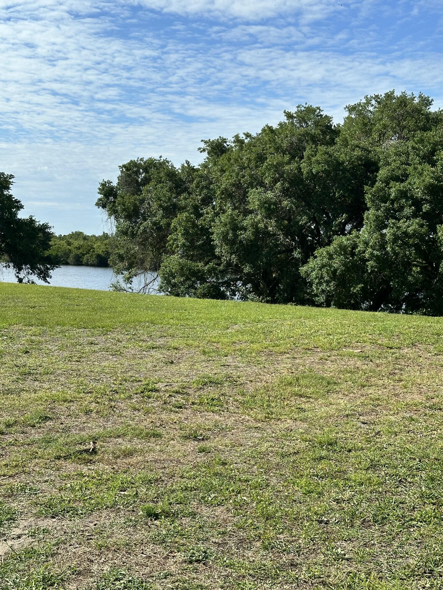 BEAUTIFUL .67 ACRE WATERFRONT LOT IN RIVER OAK ACRES!  CLEARED AND READY TO BUILD WITH BEAUTIFUL WATER VIEWS AND NAVIGABLE ACCESS TO LAKE OKEECHOBEE AND BOTH THE EAST & WEST COAST WATERWAYS-A BOATERS DREAM, PERFECT FOR FISHING AND EXPLORING!  ENJOY PEACEFUL COUNTRY LIVING WITH WIDE OPEN SPACE AND WATERFRONT SCENERY!! COME BUILD YOUR DREAM HOME ON THE WATER!