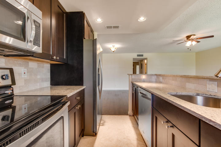 Spacious 1BR/2BA condo with over 1,100 sq. ft. of living space! Features a large primary suite with 2 closets and en-suite bath, open floor plan, alley-style kitchen, expansive living/dining area, and oversized Florida room. Shared laundry with only 3 neighboring units. Located in a desirable 55+ community with pool and great amenities. Prime Delray Beach location close to shopping, dining, golf, and beaches. Great opportunity to enjoy South Florida living!
