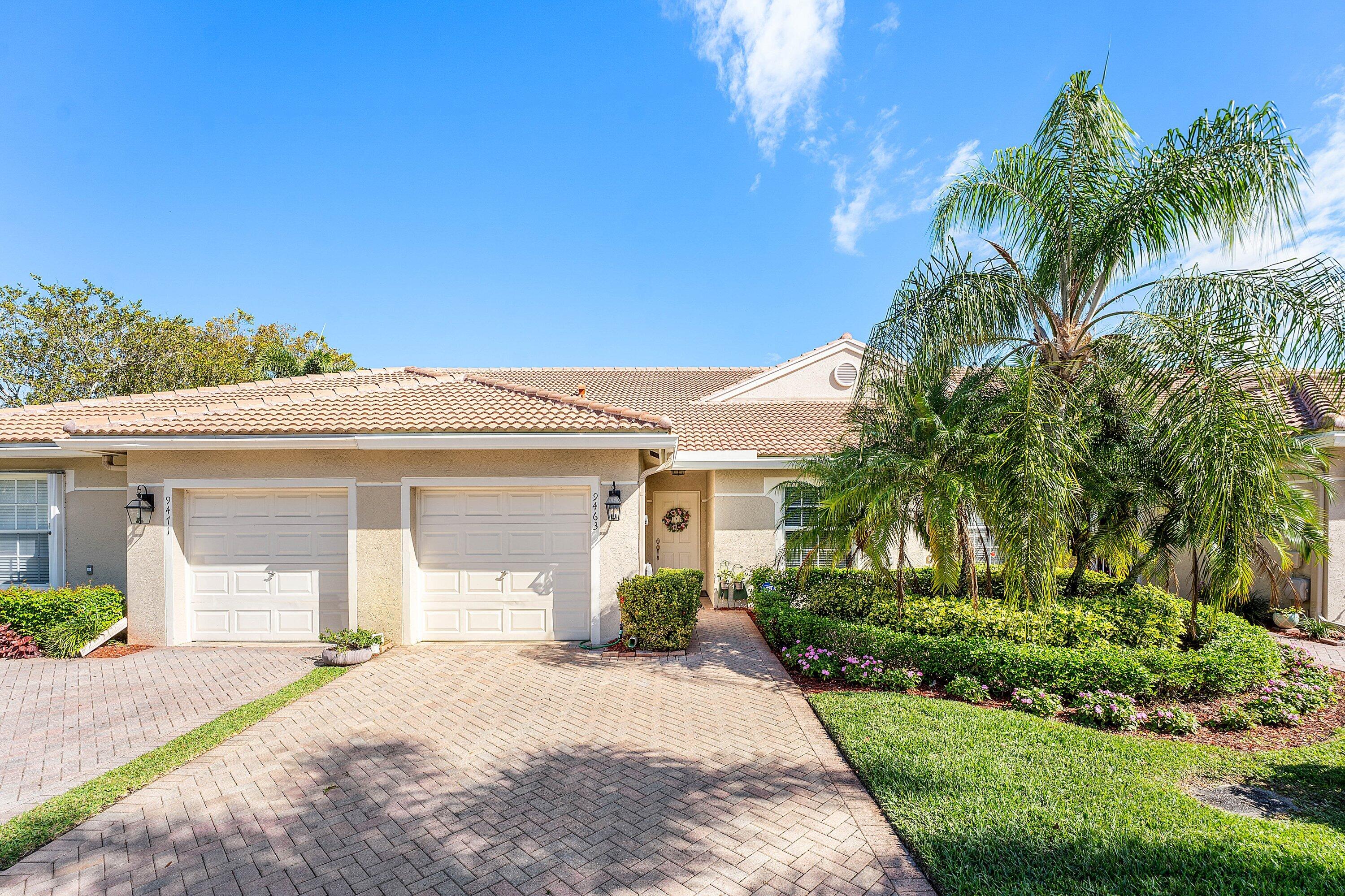 This beautifully updated lakefront villa blends timeless comfort with fresh, modern style. A brand new roof and full impact rated windows provide peace of mind, energy efficiency, and year round storm protection, while filling the home with natural light and sparkling water views. Inside, the layout feels bright, open, and effortless. The updated kitchen features a clean, contemporary design and opens completely to the living and dining areas — perfect for entertaining or simply enjoying the lake breeze drifting through the windows. Step outside to your private oasis: a picture frame screened lanai that perfectly frames the lake like artwork, creating a serene backdrop for morning coffee or evening wine. Beyond the lanai, a pavered patio expands your outdoor living space. With 2 spacious bedrooms and 2 beautifully updated baths, this villa offers comfort, style, and low maintenance living in one of the most peaceful lakefront settings. Inside home features newer appliances, AC 2021, eye catching tile flooring throughout, pull down attic stairs located in the garage with flooring for easy access, exterior has been freshly painted 2026. HOA fees include high speed internet, all premium cable channels, home alarm provided by ADT, home phone, landscaping, pest control, 24-hour manned gate for extra security. The clubhouse features card rooms, billiards, library, ballroom with shows, bingo and more, fully equipped gym, exercise room with classes, craft room, movie/media room, many clubs to join, gorgeous resort style pool area with a resistance pool, lap pool, pool and jacuzzi. This is Florida living at its finest!  Back on the market but won't last long! This is the perfect home to move right in. No work is needed! New roof, impact windows, updated flooring and remodeled kitchen. This home is genuinely unique from all the others.