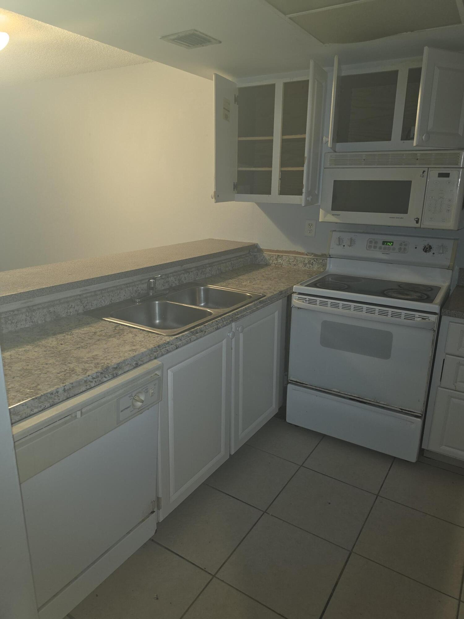 SHERWOOD GARDENS CONDO - Residential Lease