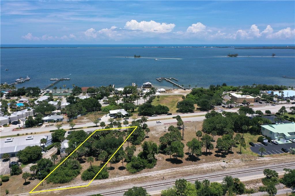 Build your own business in the middle of Sebastian with over 100' of US HWY #1 frontage and just over 1/2 acre. This listing includes one lot. Owner will also sell this lot along with the southern adjacent lot or all four lots. Call for additional information.
