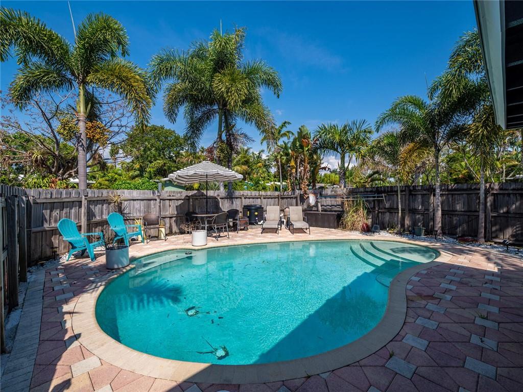 This wonderful 3/3 corner lot home in Wilton Manors Westside is ready and waiting for you.  Highly sought-after features include an inground heated pool with a salt chlorine generator, solar panels with a dual battery storage system, a two year old metal roof, impact doors and windows, tankless water heater and a circular driveway with entrances on two streets.  Enjoy significant savings year round and electricity during short and long term power outages.  Less than one mile to "The Drive," Wilton Manors' famed entertainment and dining district.  Approximately three miles to the beach.  Less than 1/4 mile from Mickel Park, which offers recreational, exercise and entertainment opportunities.  No HOA or rental restrictions.  $20,000 CREDIT TO BUYER AT CLOSING!
