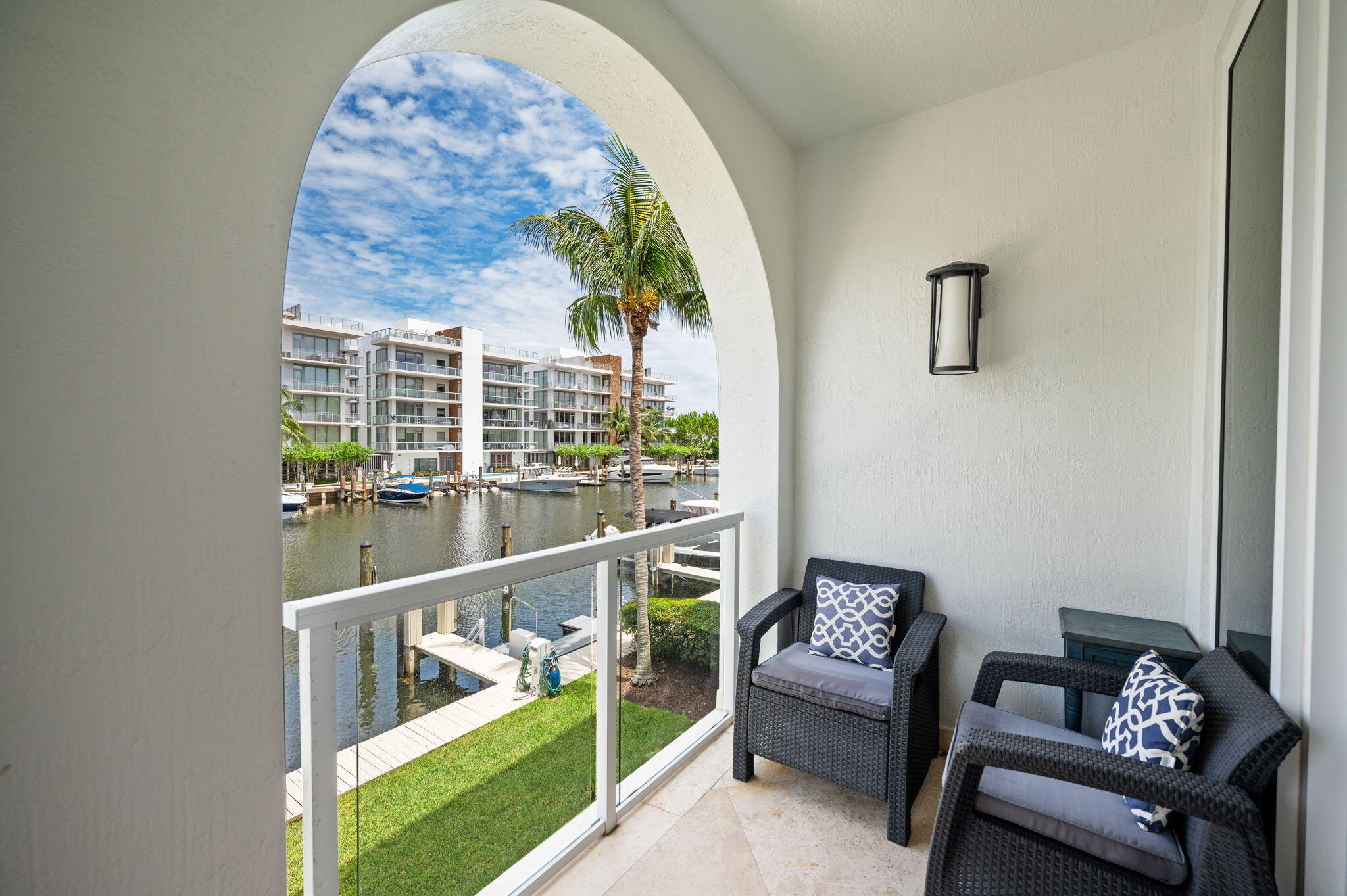 Experience the Las Olas lifestyle with the ease of condo living and the convenience of an on-site marina. Deep waterfront corner residence with a 42 FT deeded dockage ideal for boating and no fixed bridges for effortless ocean access. Enjoy breathtaking sunrises & serene sunlit views while watching endless yachts cruise from your expansive wall to wall balcony  overlooking your private boat and through your floor to ceiling sliding doors & windows the minute you step into this stunning oversized split 3 bedrooms, 3 1/2 bath floor plan.  Expansive Primary ensuite overlooking the canal with custom walk in closets and oversized bathroom. Dedicated laundry room. Remodelled bathroom. Marble floors throughout. Open gourmet kitchen. 2 A/C zones. 2 assigned parking spots.  The Meritage is an impeccably maintained boutique secured building and  includes a semi-private elevator with foyer entry, gated garage parking with EV charging capability, separate storage room, gym, pool & jacuzzi.  Perfectly located within walking distance from everything the city has to offer - Las Olas, dining, shopping, entertainment, Fort Lauderdale beach and minutes from highways and airports.