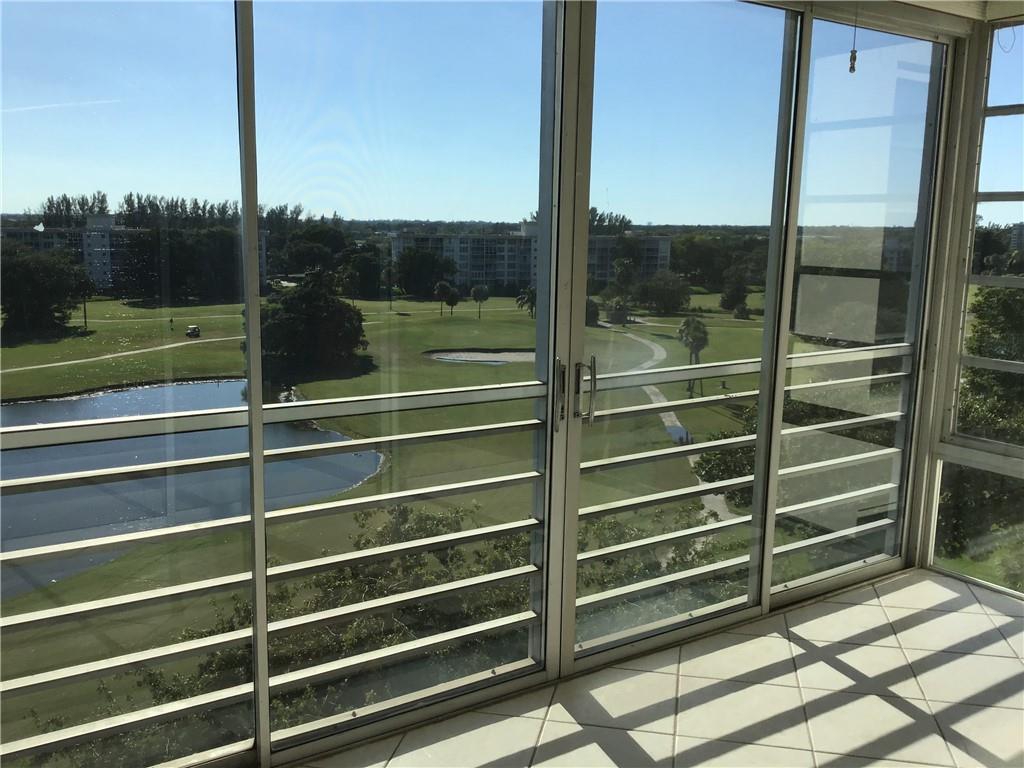 BREATHTAKING GOLF COURSE AND WATER VIEWS FROM THIS 8TH FLOOR UPDATED TWO BEDROOM, TWO BATH CONDOMINIUM IN PALM ARIRE COUNTRY CLUB. NEUTRAL TILE FLOORING THROUGH THE MAIN AREAS, KITCHEN AND BALCONEY. OPENED KITCHEN WITH SS APPLIANCES & GRANITE. UPDATED BATHROOMS. BOTH GLASS & SCREENED ENCLOSED PORCH. IMPACT WINDOWS ON FRONT. UNBELIEVABLE SUNSET VIEWS.RESORT STYLE AMENITIES INCLUDE CLUBHOUSE, HEATED POOL, GYM & SAUNA AND TENNIS COURTS. MINUTES FROM THE BEACH, FLL AIRPORT, MAJOR HIGHWAYS, SHOPPING, DINING AND THE ISLE CASINO. EXISTING HOME WARRANTY PAID UNTIL APRIL 2022. LAUNDRY ON EACH FLOOR. ALL AGE COMMUNITY. SORRY NO PETS AND NO LEASING THE 1ST YEAR. ASSOCIATION REQUIRES 20% DOWN.