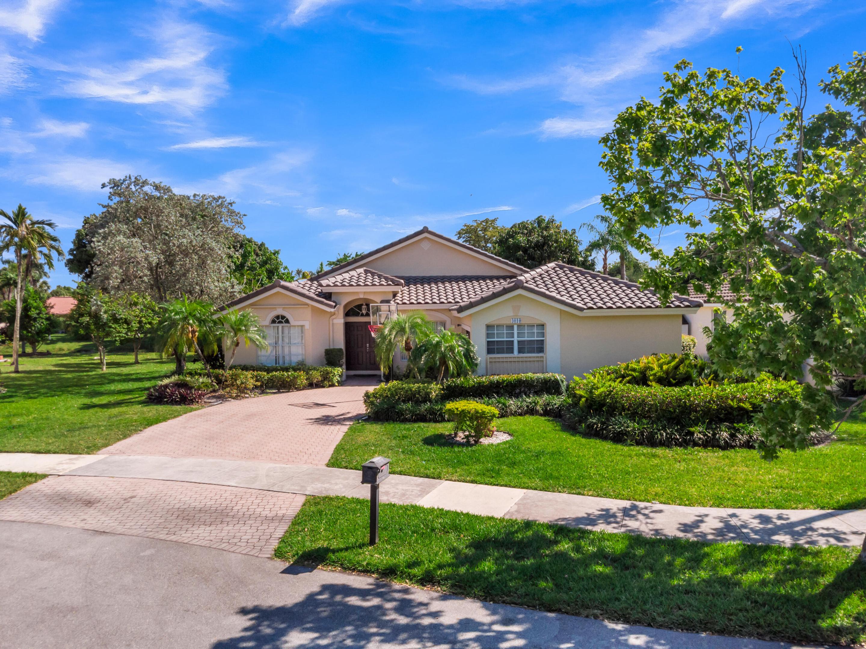 Welcome to this beautifully maintained 3-bedroom, 2-bathroom single-family home with a 2-car garage, ideally located on a quiet cul-de-sac in the heart of Coconut Creek. This inviting residence features tranquil water views from the screened-in patio, offering the perfect setting for relaxing or entertaining. Inside, you'll find laminate and ceramic tile flooring throughout, along with a thoughtfully updated kitchen featuring stainless steel appliances. Outside, the freshly painted exterior, brand-new roof, screened porch, and generously sized backyard provide plenty of space for outdoor enjoyment. Conveniently located near parks, schools, and shopping, this exceptional home in Winston Park offers the perfect blend of comfort, style, and everyday convenience.