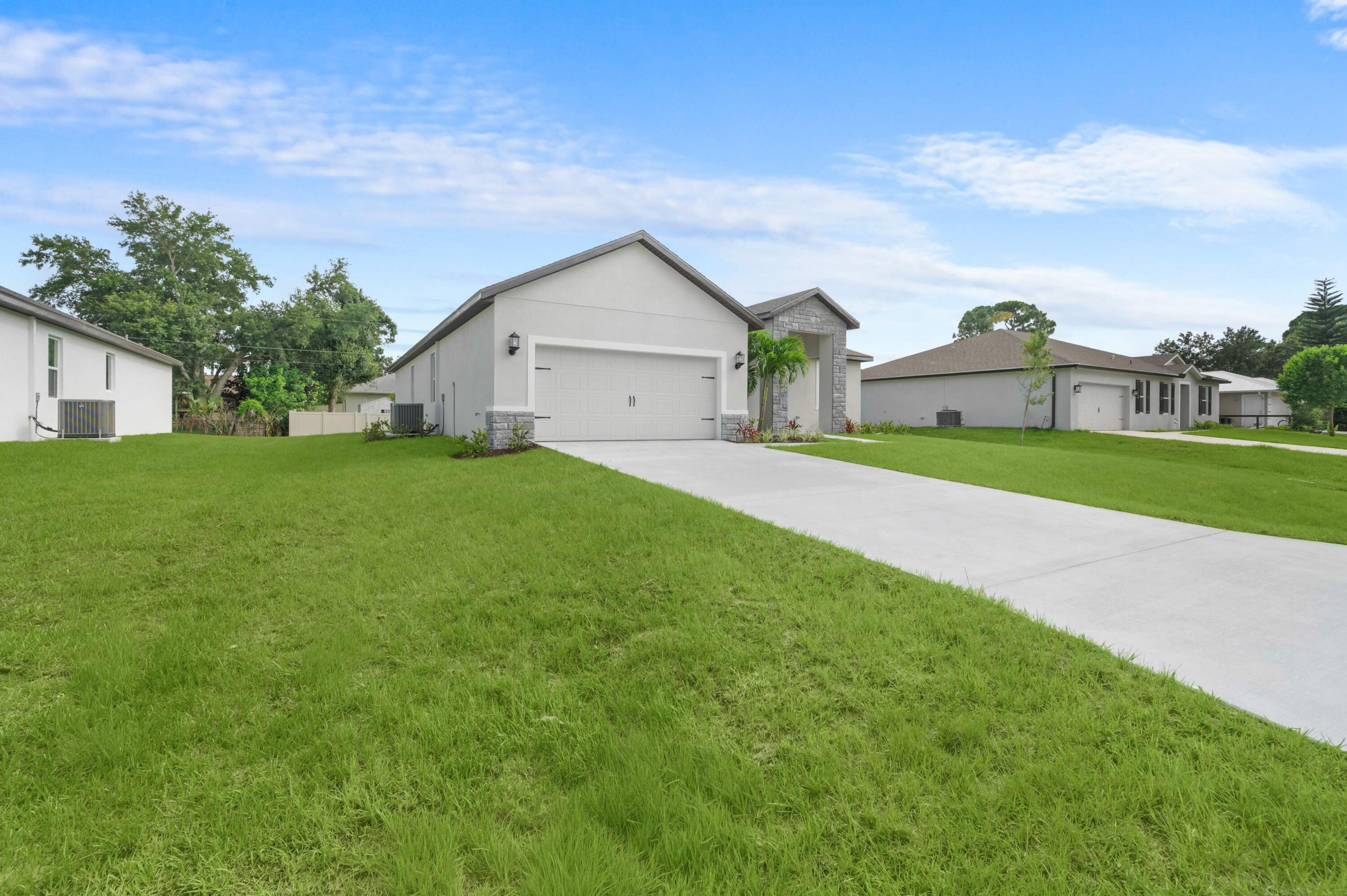 Ask about builder-paid closing costs & no down payment options! The Greenfield plan features 4 beds, 3 baths, and a spacious open-concept layout ideal for everyone. Enjoy thousands in upgrades, including energy-efficient Whirlpool® appliances, granite countertops, wood cabinets, brushed nickel hardware & a 2-car garage. A flex space offers room for a second gathering area, home office, or playroom. Located near Whispering Pines Park, with easy access to I-95 & the Turnpike. Close to top-rated schools, shopping, dining, beaches, & entertainment. Live in comfort, style, and convenience in this thoughtfully designed home. Appliance models subject to availability. *