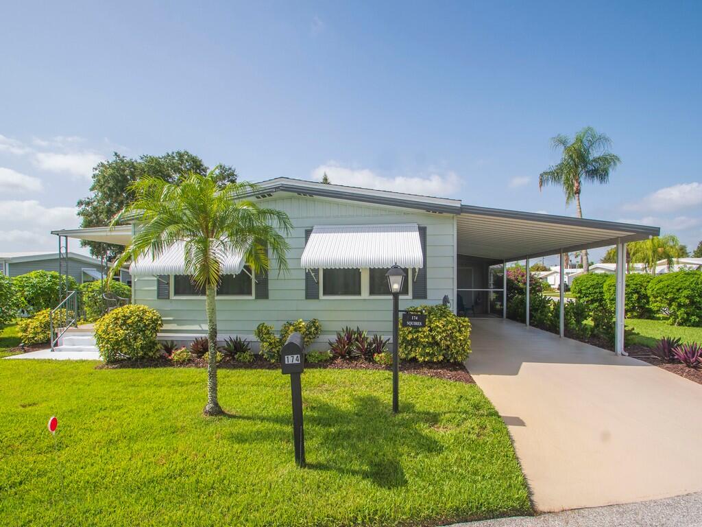 Welcome to this charming 2-bedroom, 2-bathroom manufactured home located in the 55+ community of Pinelake Village, Jensen Beach, FL and just minutes to shopping and the beaches. This home offers 1,152 square feet of finished living space, providing comfortable and efficient accommodation. The thoughtful layout with two full bathrooms ensures convenience for all residents. This home is very well maintained and in move-in ready condition. Lot rent is only $805 per month and includes cable, trash removal, recycling and all the amenities of the clubhouse.  Schedule your private tour today.