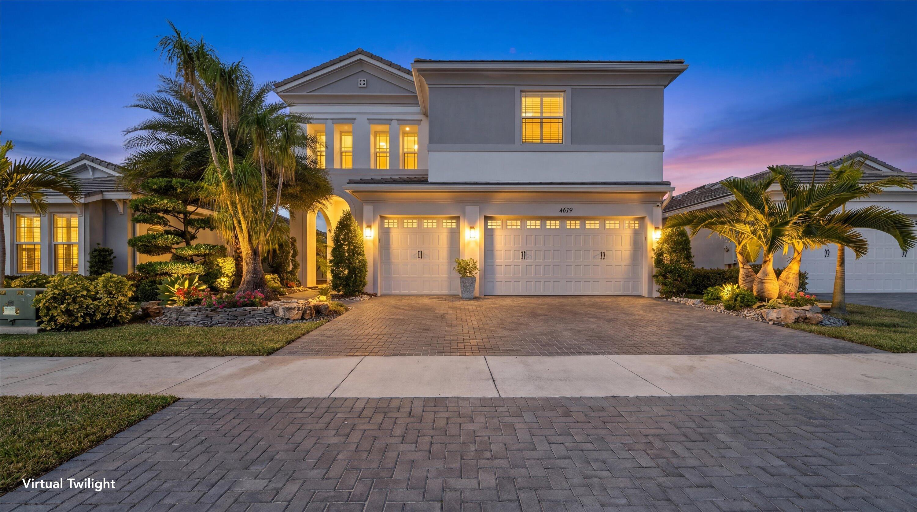 Welcome to this meticulously designed 5-bedroom, 4-bathroom, 3-car garage home located in the highly sought-after community of The Groves at Westlake, offering breathtaking lake views. This impressive Laurel Grand model boasts an open floor plan with soaring high ceilings, creating a spacious and inviting atmosphere throughout. The heart of the home features top-of-the-line stainless steel appliances, sleek quartz countertops, and plenty of storage for the culinary enthusiast. Enjoy peace of mind with premium impact-resistant windows and doors, ensuring safety and energy efficiency. Step outside to your private oasis, featuring a pergola, marble pavers, a custom outdoor kitchen and a large TV - perfect for entertaining or relaxing by the lake. Both front and back yards have been  beautifully landscaped with meticulous attention to detail, adding curb appeal and outdoor elegance. Experience the vibrant Westlake community, filled with amenities designed to enhance your lifestyle. Enjoy a resort-style pool complete with a 3-story water slide and splash pad, a snack shack, an outdoor concert pavilion, basketball courts, an adult swimming pool, and a playground. For your furry companions, the dog park provides a perfect space to run and play. Stay active on the new fitness trail featuring 9 obstacles or visit the BMX park for some exhilarating fun. You'll also have access to Westlake's highly acclaimed A-rated schools, ensuring exceptional education and enriching opportunities.