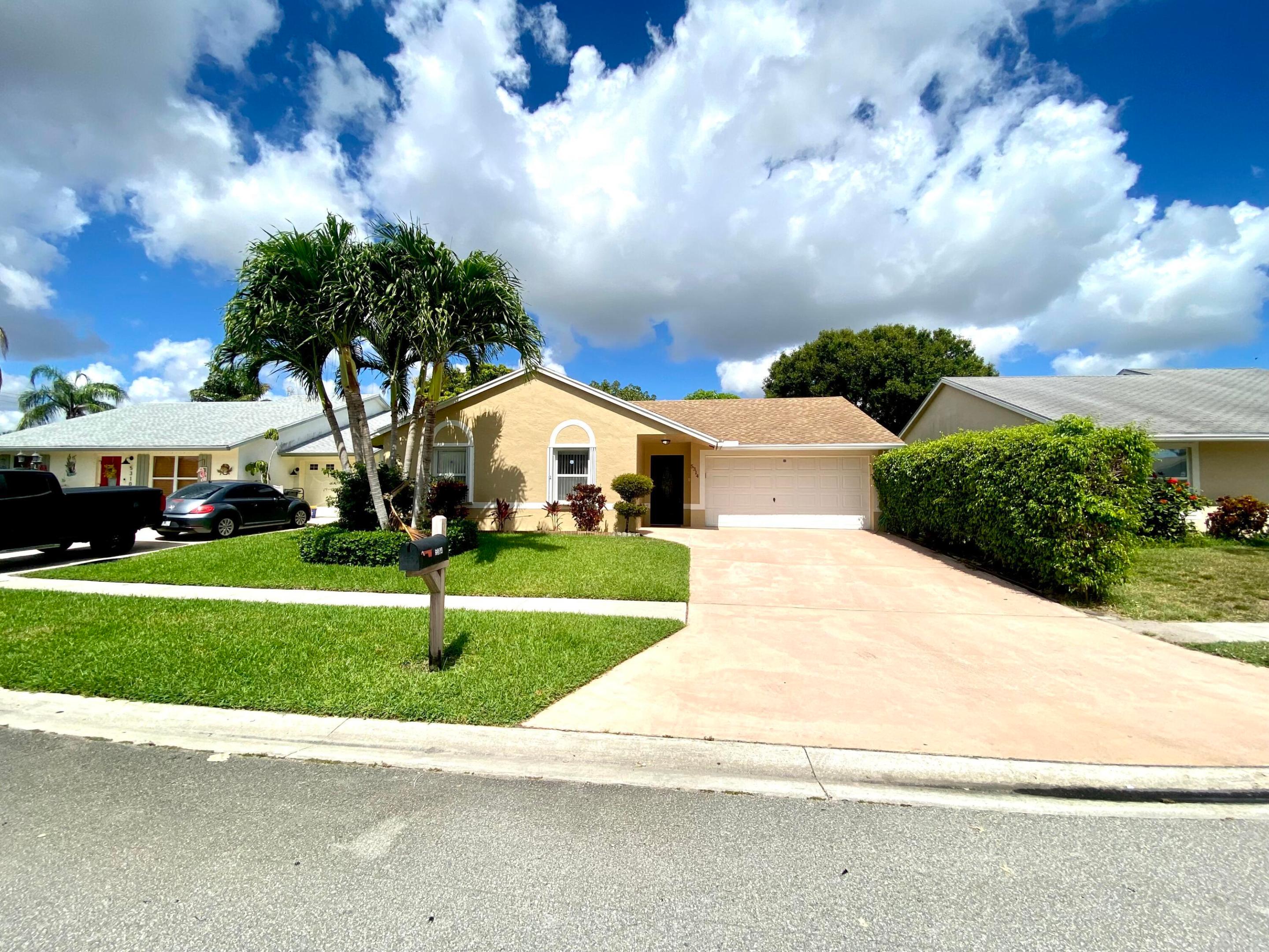 Welcome to this charming three-bedroom, two-bathroom single-family residence nestled in Lee Estates  in Lake Worth, Florida. This waterfront property offers 1,255 square feet of finished living space on one story, providing comfortable and accessible layouts throughout. The home features a two-car garage for convenient vehicle storage and protection. Situated in an established community setting, this residence combines the appeal of waterfront living with practical single-story design, making it an excellent choice for those seeking waterfront property in the Lake Worth area.