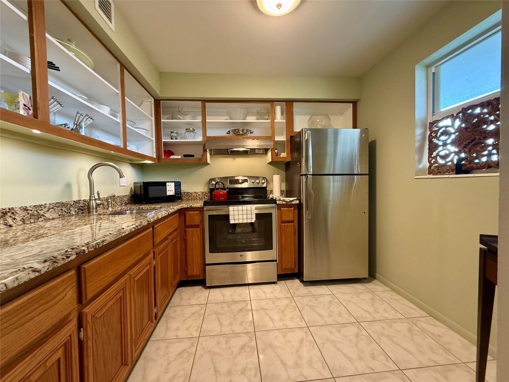 LOWEST PRICED UNIT IN THE COMPLEX!!! 55+ Community! IMPACT WINDOWS in kitchen, bedroom & bath! Updated Bathroom, Updated Kitchen with GRANITE counters & Stainless-Steel Appliances. 4th floor is the top floor. Wonderful eastern views of the canal from the bedroom and the enclosed balcony. Tile floors in living/dining, kitchen, foyer and bathroom. Laminate wood floors in the bedroom. Very clean and newer Central AC. Great location within the complex, directly across from the pool area. CASH ONLY! NEW 2026 MONTHLY MAINTENANCE INCLUDES PARTIAL RESERVES. Rentals Once a year for 90-180 Days only. Owner occupied. All appointments must be scheduled 48 hours in advance.