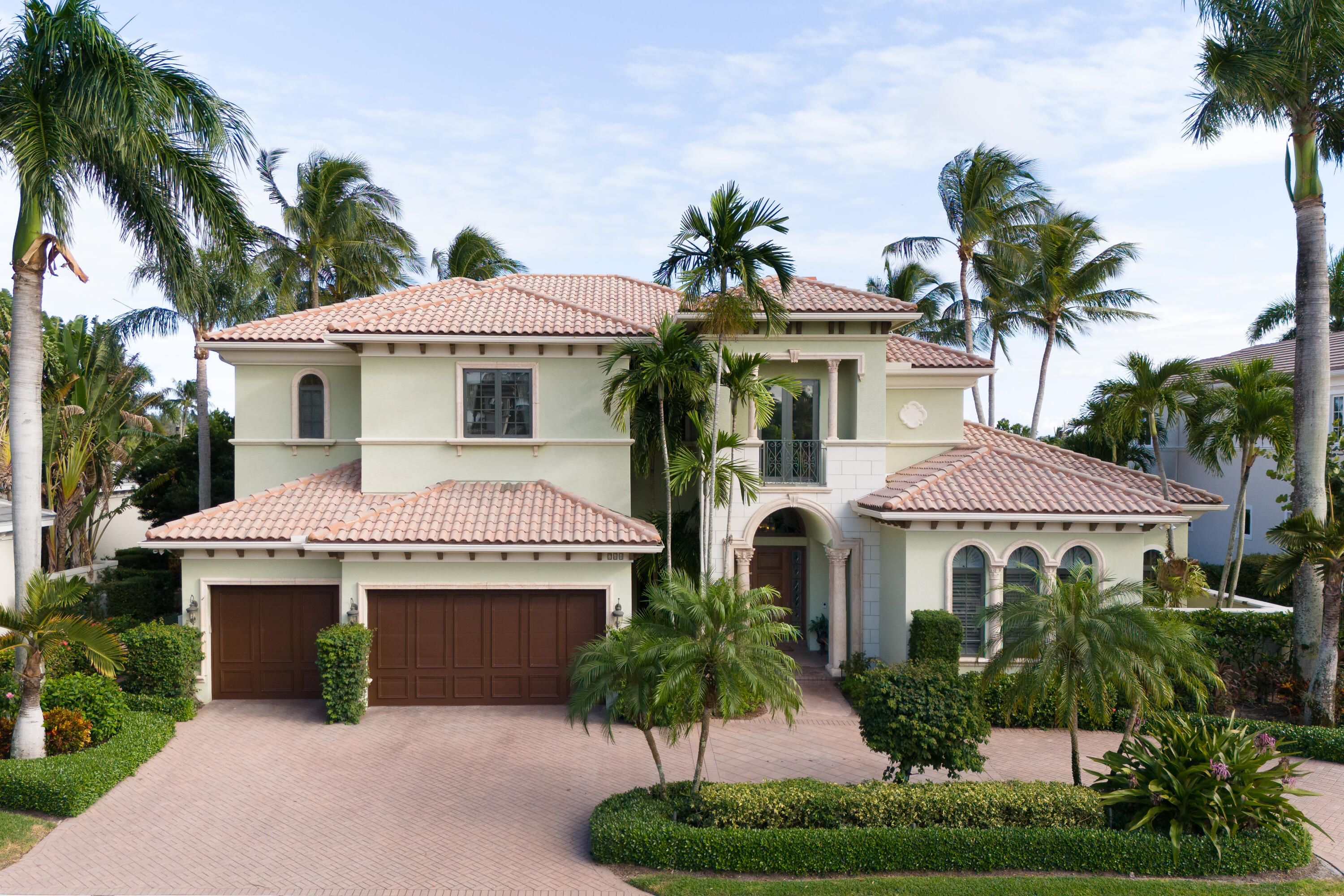 A boaters dream! This lovely estate home has 100' of deep water frontage on a beautiful wide canal in the coveted gated community of Harbour Isles. The home sits directly on the North Palm Beach Waterway which has a no wake zone and no fixed bridges, a private dock with water, electric and a 15,000 lb boat lift. There is room to expand the dock if necessary. The outside oasis continues with a pool and spa, outdoor kitchen and gas fire pit. Some of the features in this beautiful home are the saturnia marble flooring throughout the main living spaces, natural gas cooktop, double Sub Zero refrigerators, wet bar, ensuite baths in each bedroom, a separate office, a separate sitting area within the primary suite, upstairs living space, cabana bath, impact windows and generator.