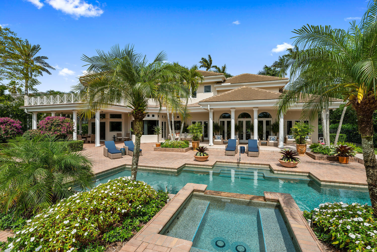 Fantastic location, right in the heart of Palm Beach Polo. This grand two story impeccably renovated and maintained control 4 smart home, sits on over 3/4 an acre. Room for both family and entertaining this 5 bedroom 5.1 bath plus office/den home with spacious 3 car garage features a western view with fabulous sunsets. Enjoy the resort style saltwater pool area including sauna, spa, cabana bar and grill, fire feature and 3 covered loggias, including one with new retractable screens. Recent updates include, a newer roof, impact glass, updated HVAC, chef's kitchen with Wolf gas range, Sub-Zero refrigerator and freezer, double Bosch dishwashers, beautiful Marble center island and counters. This property contains all the ingredients for enjoying life and making lasting memories. A rare find