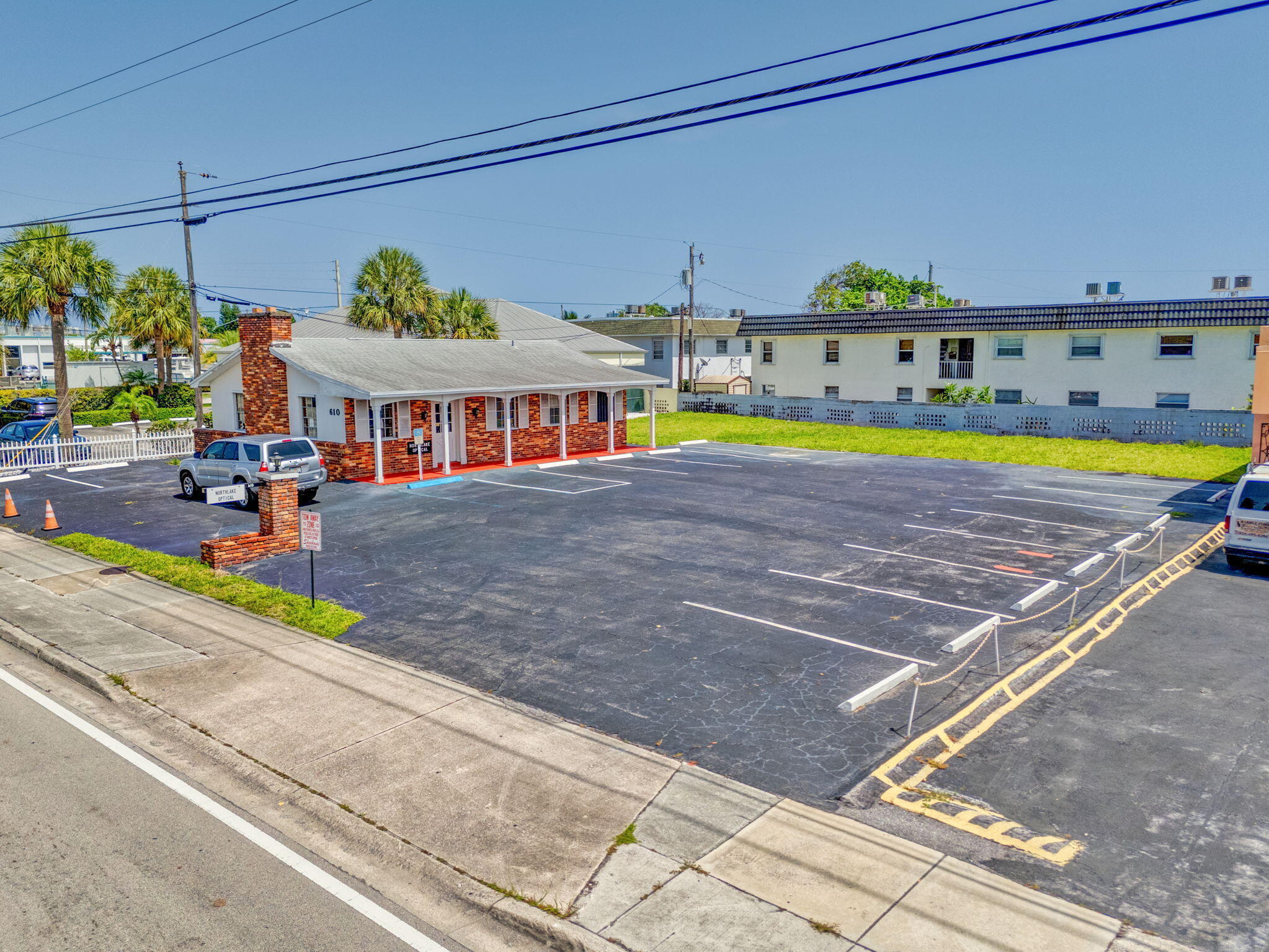 Position your business for success at this highly visible freestanding commercial building on Northlake Boulevard. Offering 1,040 SF on a 0.34-acre parcel, excellent frontage, strong daily traffic exposure, and convenient access to I-95, US-1, and surrounding residential communities.  The flexible layout is suitable for retail, office, medical, professional, and service-based users. With approximately 17 on-site parking spaces, prominent signage opportunities, and a standalone presence, this property provides a rare opportunity for businesses seeking visibility and convenience in Northern Palm Beach County.  Whether you're expanding an existing operation or opening a new location, this site offers the accessibility, exposure, and functionality needed.  After CAM: Estimated $6,637/Mo