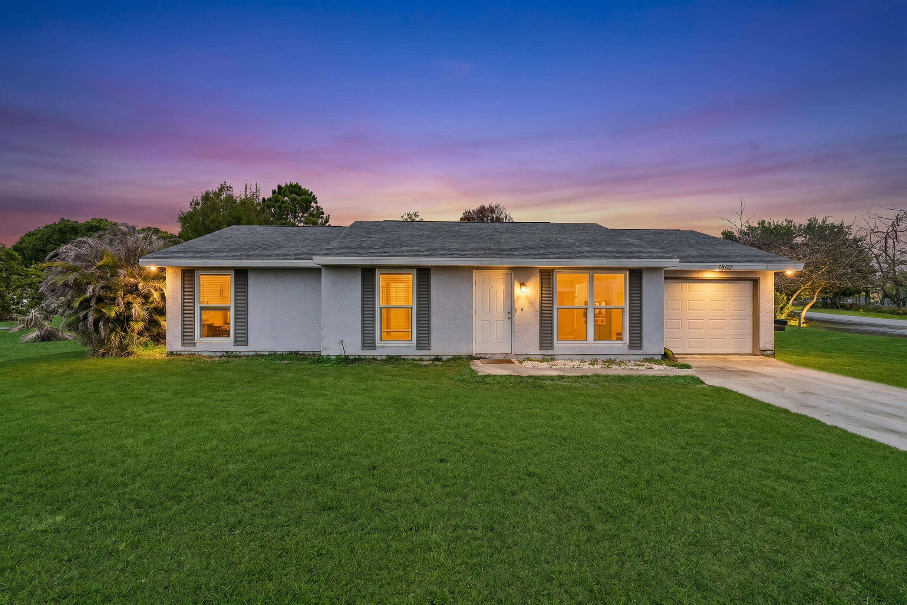 Discover comfort and convenience in this beautifully maintained 3-bedroom, 2-bathroom home situated on an oversized corner lot in a highly desirable location. Featuring updated vinyl plank flooring throughout, this home offers a modern and inviting feel from the moment you walk in. The front of the home is equipped with impact glass windows, adding both style and peace of mind. Step outside to enjoy the fully fenced backyard — perfect for entertaining, pets, or creating your own private outdoor oasis. With plenty of yard space and a prime location close to shopping, dining, schools, and major roadways, this property is a must-see!