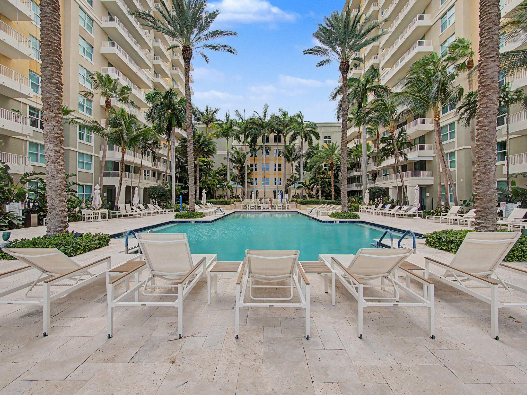 Rarely available 3 bed corner unit with coveted SE exposure. Offering breathtaking, unobstructed views of the Intracoastal Waterway, marina, nature preserve, and the Atlantic Ocean. Situated on the 14th floor in one of Marina Village's most desirable stack is bright with open floor plan with lots of natural light. The wraparound balcony creates the perfect extension of your living space, where you can enjoy morning coffee overlooking the sparkling water or unwind in the evening as boats cruise by. The design makes this home ideal for both living and entertaining.Marina Village offers an exceptional resort-style lifestyle with pool and spa, state-of-the-art fitness center, sauna, billiards room, movie theater, business center, and Amazon package room. Perfectly situated close to the  beach, waterfront restaurants, marina, charter fishing, downtown Boynton Beach, and just minutes from the renowned dining, shopping, and Delray Beach's Atlantic Avenue.  Convenient access to I-95. This is South Florida coastal living at its finest—where spectacular views, luxury amenities, and an unbeatable location come together to create the lifestyle you've been wanting. Information is deemed reliable and subject to error and omission. It is the buyers responsibility to verify all information. All measurements are approximate and subject to errors.