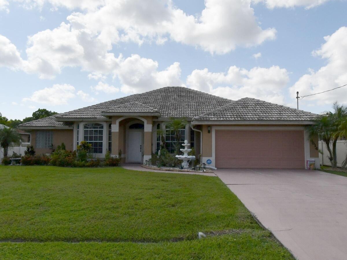 Welcome to this spacious and inviting 4-bedroom, 2-bathroom home nestled in a quiet, desirable neighborhood. Designed for both comfort and functionality, this property features a well-laid-out floor plan with generous living spaces perfect for everyday living and entertaining.  The home offers four well-proportioned bedrooms, ideal for families, guests, or a home office setup, along with two full bathrooms for added convenience. The bright and functional kitchen flows seamlessly into the main living and dining areas, creating a warm and welcoming atmosphere.  Step outside to enjoy a fully fenced-in yard—perfect for pets, play, or private outdoor gatherings. Whether you're relaxing or hosting, the outdoor space provides both security and flexibility.