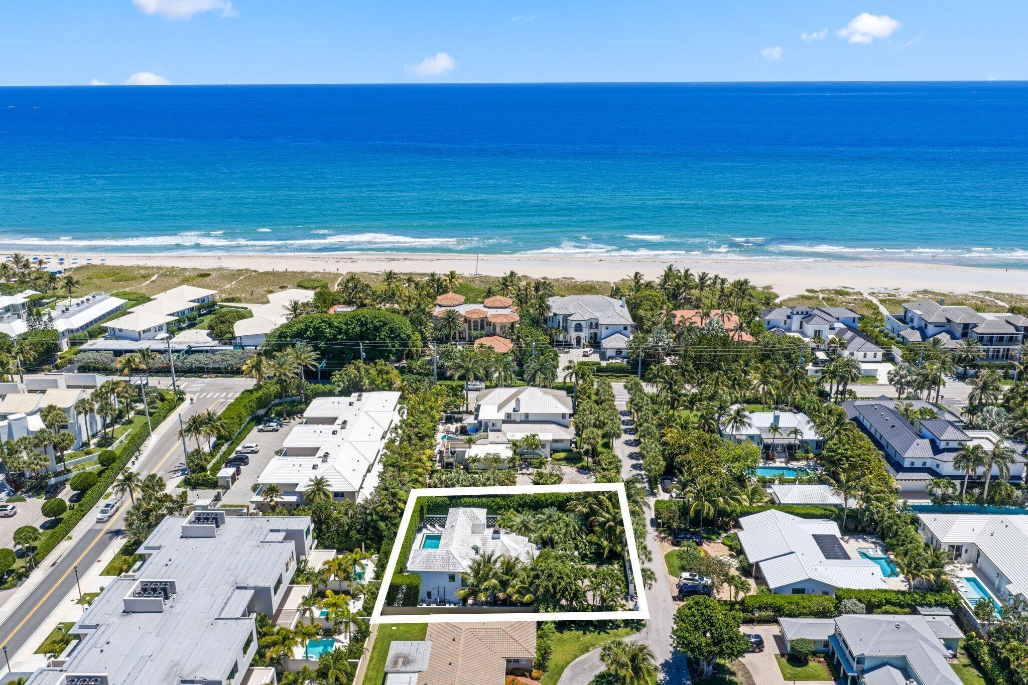 Experience the perfect blend of luxury, privacy, and coastal living in this fully renovated tropical retreat just steps from the beach and only blocks from Atlantic Avenue. Surrounded by impeccable, architecturally designed landscaping including towering 25-foot privacy hedges, this 5-bedroom, 6-bath residence offers exceptional seclusion and resort-style ambiance.   4 of the bedrooms include renovated en-suites. Inside, complete with Italian porcelain tile, quartz countertops, and custom cabinetry throughout the chef's kitchen and all bathrooms. A flexible floorplan features 3 bedrooms on the main level and 2 upstairs, with potential primary suites on both floors. Complete with a 2021 roof and impact windows, this is a rare opportunity to own a private Delray Beach oasis.