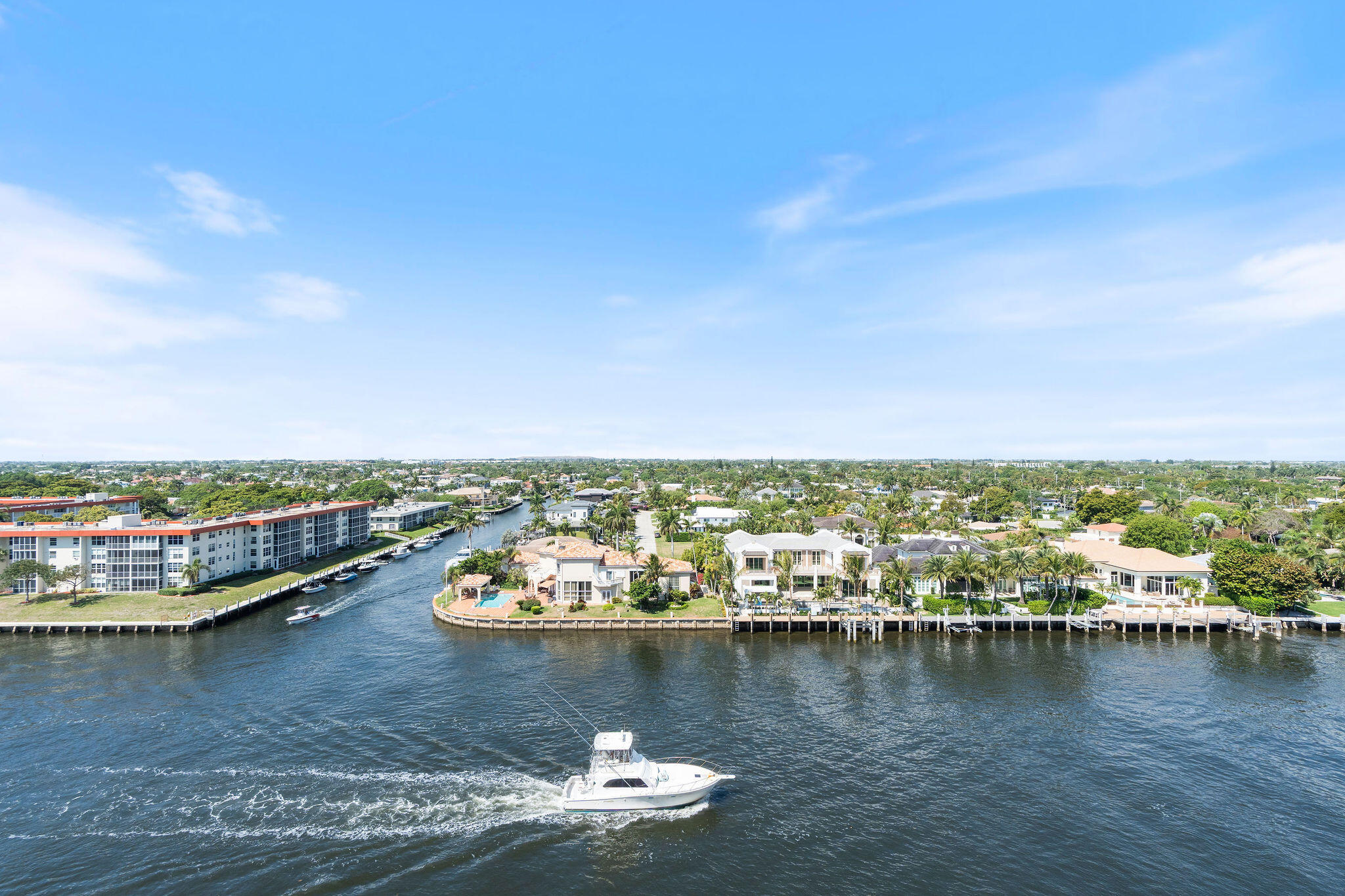 Experience elevated coastal living at 1160 Hillsboro Mile #904 in the prestigious Hillsboro Beach "Millionaire's Mile."  This 9th-floor oversized 2-bedroom, 2-bath residence offers unobstructed Intracoastal views with stunning ocean views from the front of the unit, delivering both sunrise and sunset backdrops from your own home. Enjoy a true front-row seat to South Florida's iconic boat parade and daily yacht activity.  The residence is located in a well-maintained, resort-style building featuring private beach access (key entry) and boat dockage up to 42 feet (when available). Residents enjoy a full suite of amenities including a heated pool, fitness center, clubhouse, rentable party room, BBQ area, car wash station with vacuum and air, on-site manager, and covered under-building parking The building has completed all major improvements and passed its 40- and 50-year inspections, including new balconies, railings, roof, paint, hurricane-impact windows and doors, updated elevators., and so much more. The bridge to the island has also been fully repaired, and the property features a new street-facing building sign. Nearly $100,000 in special assessments have already been paid by the seller, offering peace of mind and long-term value.  Set on a private island in one of South Florida's most desirable beachfront communities, this is a rare opportunity to own a turnkey waterfront residence with both ocean and Intracoastal exposure.