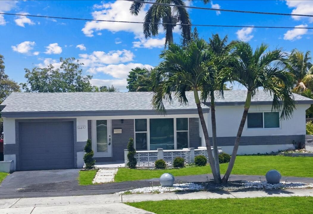 Canal front property with 3 BEDROOMS 2 Bathrooms, Pool with a large deck. Completely remodeled, roof was recently replaced, Newer SS smart appliances in the kitchen and a newer 4 Ton A/C. Impact windows. Garage can easily be converted for additional income. Ample parking,  can fit a large boat or an RV. Minutes from the beach and Casino. Must see to appreciate!!!