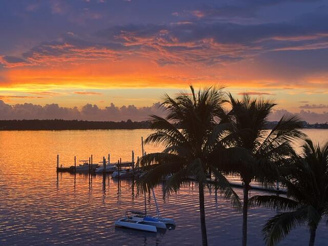 Experience spectacular sunrise and sunset views from this rare 3BR/2.5BA East-corner residence, featuring a stunning wrap-around balcony. Outfitted with complete impact windows and doors for ultimate peace of mind, this home sits in an exclusive boutique community at the Intracoastal's widest point. Enjoy sweeping views of Manalapan's oceanfront mansions and effortless inlet access for world-class deep-sea fishing.This coastal haven includes a new refrigerator, washer, and dryer. Enjoy unparalleled convenience: steps from luxury amenities and two secure under-building parking spaces. Perfectly positioned between Palm Beach Island and Delray's Atlantic Avenue. Fully funded reserves ensure lasting value. Boutique luxury won't last. Great Investment Annual Rental $7,000 Seasonal $8,000+  Always Welcome to bring your boat along we are adjacent to Gateway Marina.  It is a Full Service Dry Dock with many owners docking boats there.  The Condo Tower was initially occupied in 2012 with this being the newest Condo building on the Intracoastal in Boynton Beach and Delray Beach.  All the fire and safety in a gated and secure community with FOB access both into the community and into the tower building.  The ammenities are located on the Intracoastal waterway with state of the are pool health and safety equipment.  This is really a step into Paradise living here at Peninsula.  I am not only the Realtor but also your neighbor.  Rarely available 3 Bedroom in this complex. The property is literally over the water.