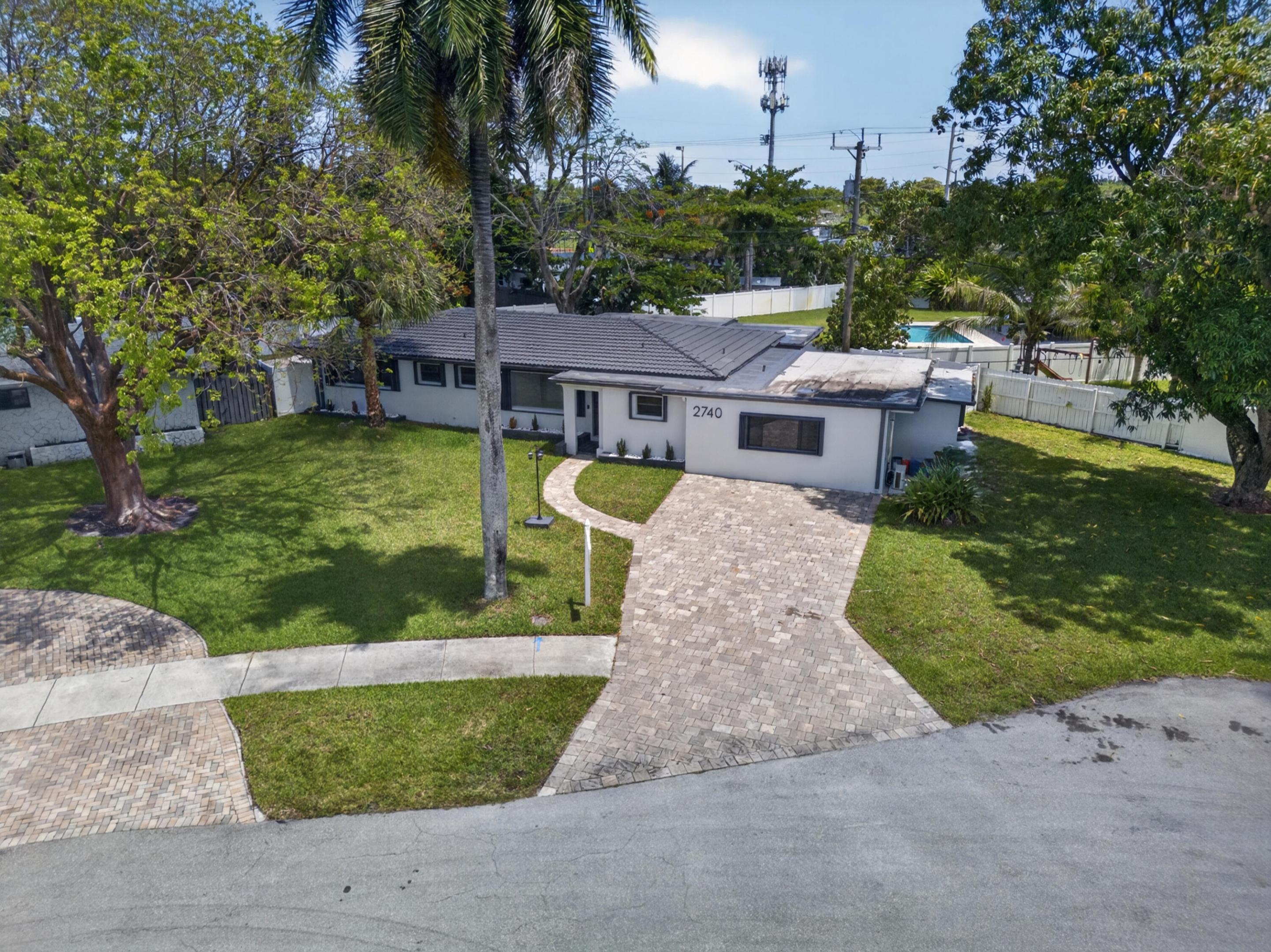 Professionally renovated in today's latest style, this stunning home in trendy Wilton Manors offers sophisticated finishes and an exceptional layout. Elegant marble flooring flows throughout the living areas, creating a sleek and luxurious feel. Situated on a quiet cul-de-sac, the property also features a private pool perfect for relaxing or entertaining.  The oversized primary suite is a true retreat, complete with two additional side rooms that can be customized to fit your lifestyle—ideal for a home office, gym, nursery, dressing room, or expansive walk-in closets. A great opportunity in one of South Florida's most sought-after neighborhoods.