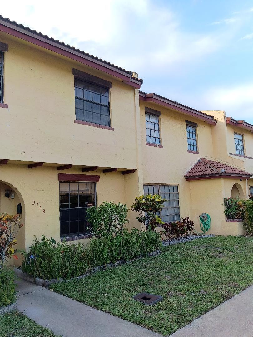 The house features 3 good size bedrooms and 2 and 1/2 bathrooms. The property is located in a very good area. It is near FLorida Medical Center in Lauderdale Lakes. The house has a covered patio where you can relax after a long day at work. Near the patio is a mango tree where you will have an abundance of mango fruits every year. Behind the house is also a nice-looking lake. Not all of the units in that community have the luxury to enjoy that lake.  The house is close to main roads and bus stops. The property needs a little TLC but it is very much worth the price. Very hard to find 3 bedrooms properties for that price. Call today before the property is gone. All ages community