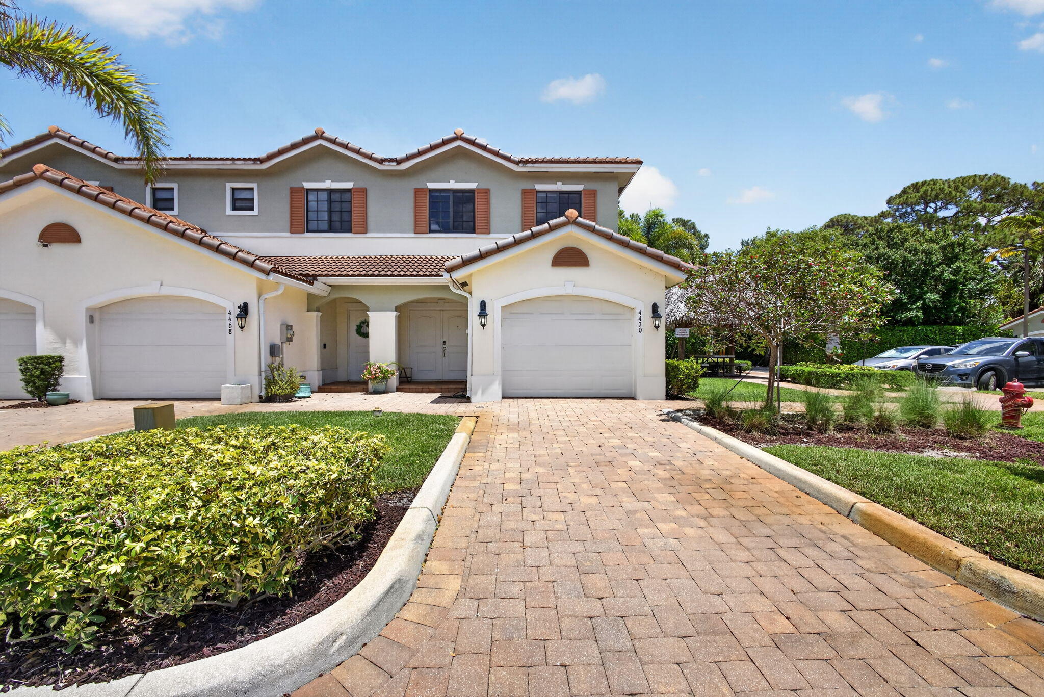 Built in 2018, this beautifully designed and spacious town home combines modern style with thoughtful upgrades throughout. Features include impact windows and doors, impressive front French entry doors, stainless steel appliances, stone countertops, custom cabinetry, fresh paint, electric blinds, and a custom closet. The spacious primary suite offers a large bedroom and a beautifully remodeled bathroom. The pantry and laundry room have also been remodeled, and recent additions include a new microwave and garage door opener. Pets are welcome, including the large dogs. Reasonable HOA fee includes water, trash, exterior care and hazard insurance. This lovely town home is move-in ready and designed for comfortable living.