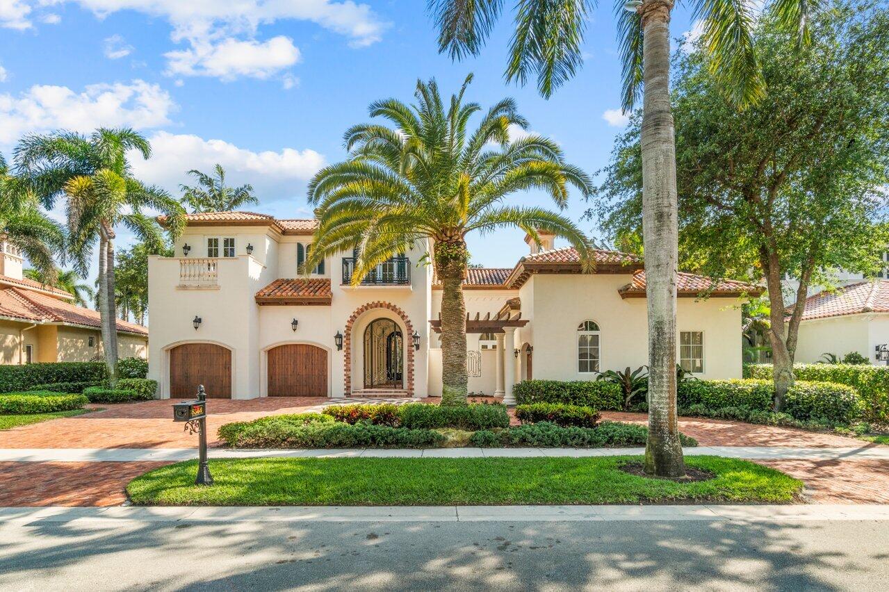Luxurious Custom Estate Golf Home located in Mizner Country Club on expansive lake & golf lot w/southern exp. & over 14,000 sq ft of land. This home has full impact glass windows, refrigerated wine cellar, elevator, circular drive,2 separate garages accommodating  3 vehicles, luxurious Brazilian cherry & marble floors throughout. Enter the front door to a dramatic staircase w/forged iron railing leading to large loft w/3 large en-suite guest rooms one w/patio access. First floor features the primary suite & expansive office w/patio & outdoor seating. Primary bath w/2 separate showers, dual sinks, 2 walk in closets, spacious suite w/sitting area which accesses the pool. Gourmet kitchen w/subzero, Wolfe, & Miele appliances opens to an expansive family room & cabana bath w/pool access. CTD... Stunning Sunsets w/lake & golf vistas seen from pool and patio.