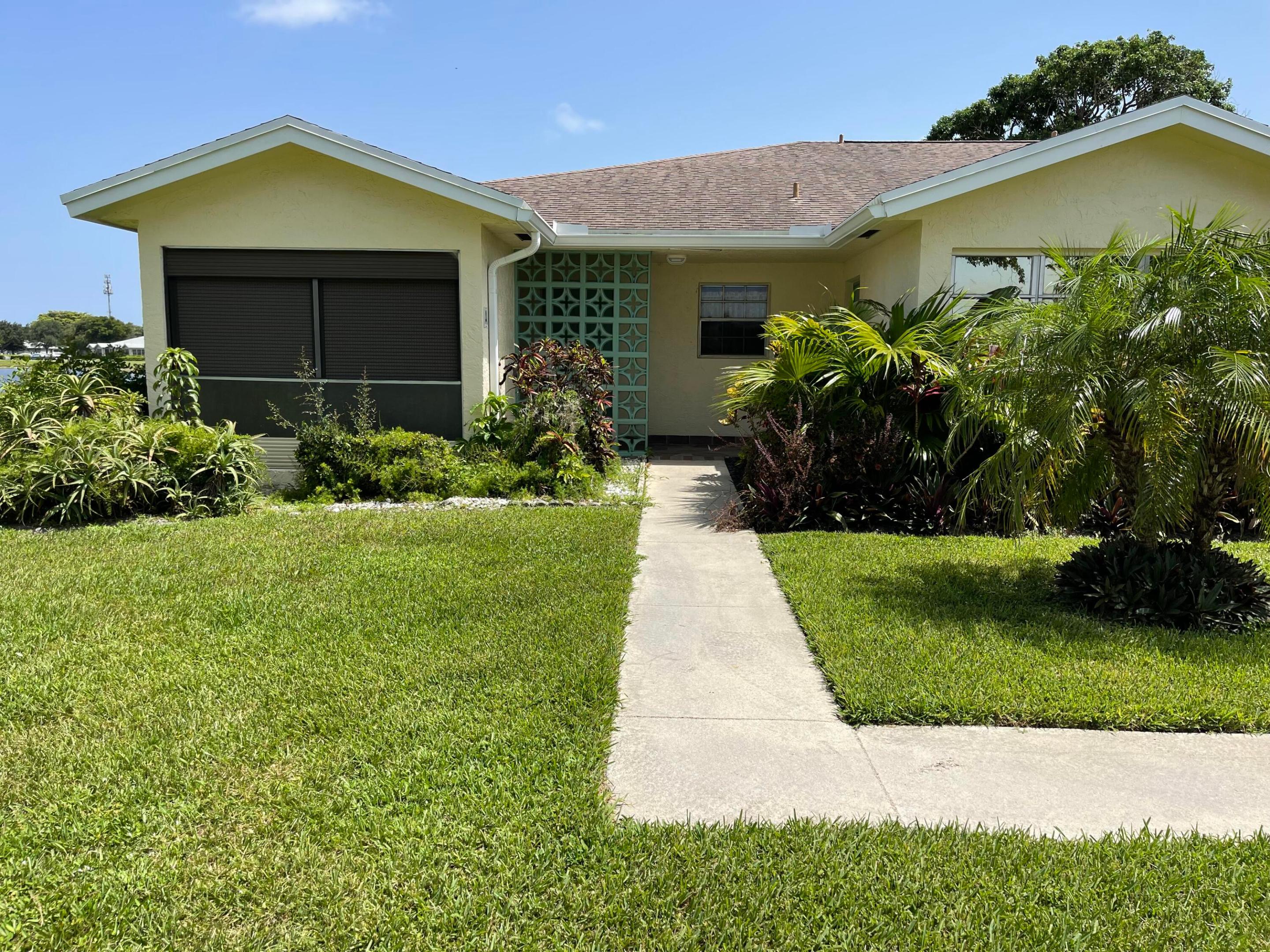 Waterfront 2/2 villa with a spacious Florida room that can be used as an extra living space.  Upgrades include updated Kitchen, updated tile floors, newer A/C, and hot water heater.  The monthly maintenance fee covers water, basic cable, lawn and shrub care, exterior pest control, trash removal and insurance on the building. exterior. It also includes contributions to reserves, The community has  a renovated saltwater heated pool and clubhouse which has pickleball, tennis, game room and fitness center. Rentals are not permitted for the first two years of ownership.