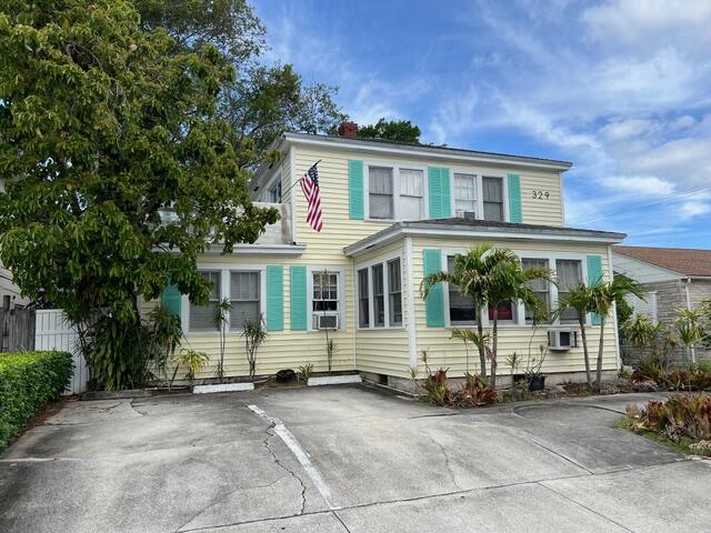 Extremely desirable six unit within walking distance of Publix and down town. All units have been redone with newer appliances, bathroom, kitchens, lighting fixture, plumbing fixtures, flooring and paint. On site laundry. Cute courtyard with lush landscaping. Consists of one 4 bedroom, 3- one bedrooms and 2 studios. Storage garage at rear of property. Unit 1 has its' own private balcony. Pride of ownership property!