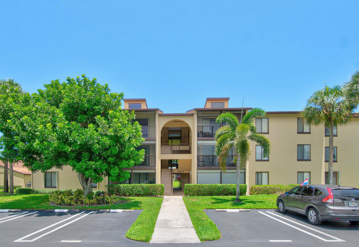 Beautifully updated 2-bedroom, 2-bath condo in the desirable Pine Ridge community of Greenacres. Move-in ready with nearly $28,000 in improvements completed from 2022-2026. Features include fresh interior paint, new laminate flooring in the bedrooms, updated lighting, custom blinds, and a renovated kitchen with granite countertops, black composite sink, updated faucet, dishwasher, and Bosch stackable washer/dryer. Both bathrooms have been refreshed with updated fixtures, refinished tubs, new toilets, and a sliding glass shower door. Additional upgrades include a newer hot water heater, HVAC maintenance, tiled patio, and professionally cleaned tile and grout. Enjoy a spacious screened patio and convenient access to shopping, dining, parks, and major roadways.