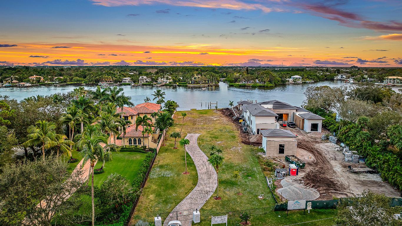 Here's a rare chance to own a waterfront lot on one of Jupiter's most desirable streets. Situated on Pennock Point, this property offers approximately 114 feet of water frontage with stunning, unobstructed water views, and views of the Jupiter Lighthouse. With no fixed bridges and easy ocean access, it's perfect for anyone who loves being on the water.

The lot is cleared, filled, and graded, setting the stage for your future vision. Pilings are already in place, making it dock-ready, and a 10,000 lb boat lift has been installed to accommodate your boating needs. Utility preparations have been thoughtfully handled, with underground systems and FPL connections already in place. The southern exposure enhances the property's appeal, providing sunlight and warmth throughout the day.

This is currently the only waterfront lot available in Pennock Point that's ready for immediate development, offering a unique opportunity to create something truly special.