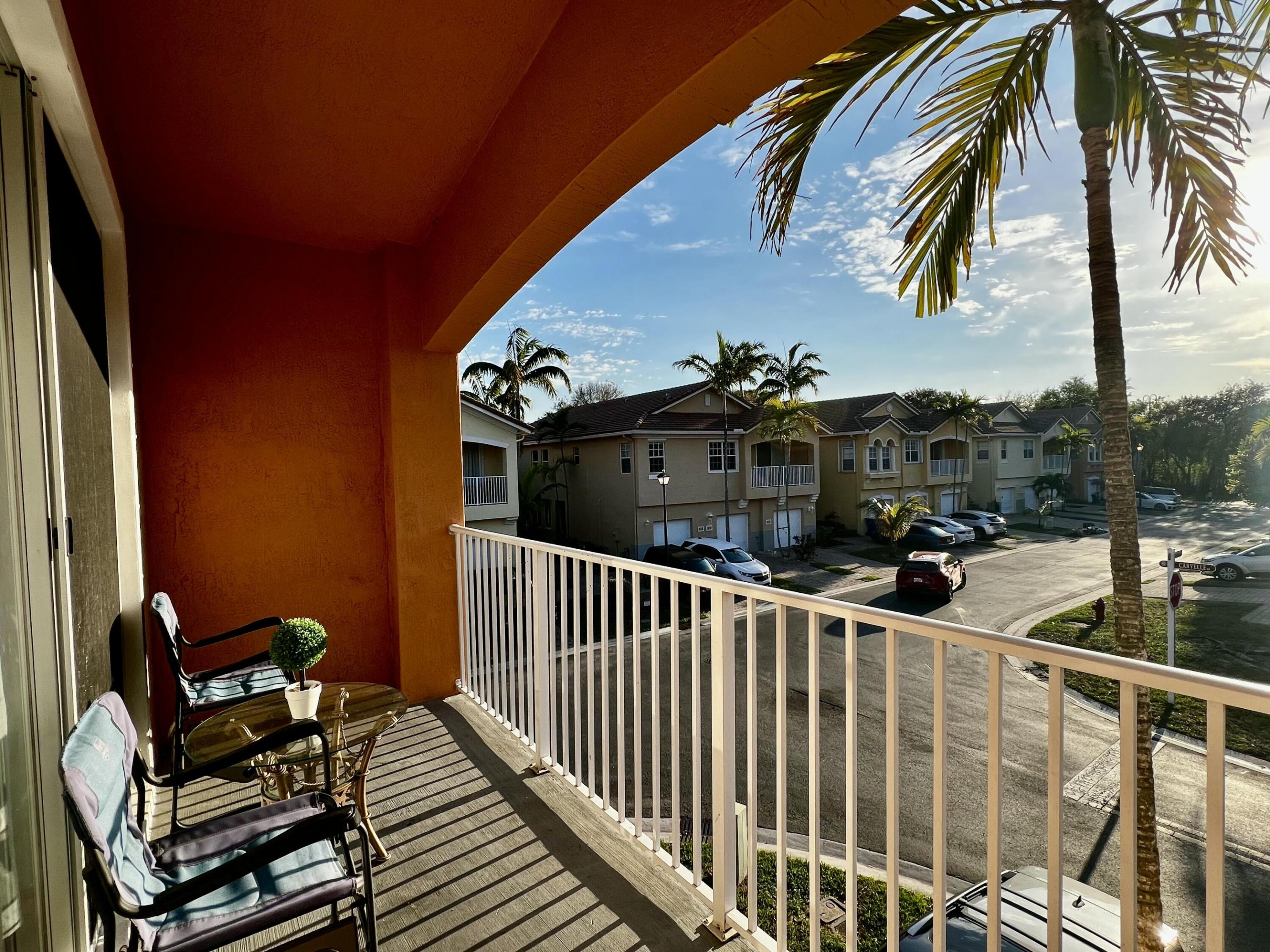 Welcome to this immaculate, move-in-ready corner townhome in the gated Villa Rosa community—an all-ages, pet-friendly neighborhood. This well-maintained home offers a bright, spacious layout with generously sized bedrooms and a large covered balcony accessible from both the living room and primary suite. Features include a NEW washer and dryer, 2026 A/C, fresh interior paint, window blinds, shower glass doors, epoxy garage floor, and hurricane shutters. Relax and enjoy at the community pool or on your private balcony. Conveniently located near I-95, minutes away from West Palm Beach airport, Riviera/Singer Island beaches, shopping, dining, and local entertainment.  Schedule your showing today!
