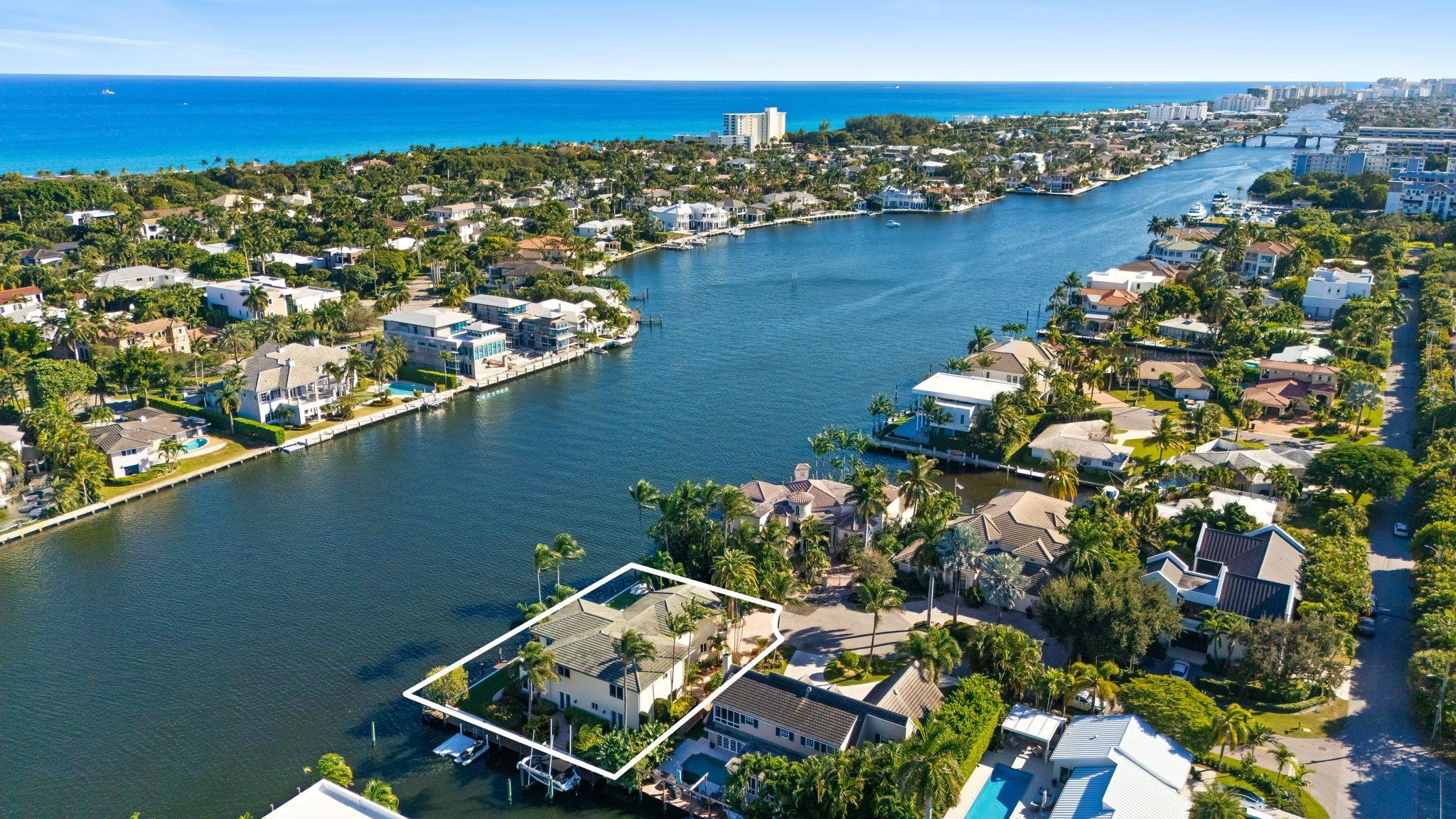 A rare intracoastal opportunity of this scale and privacy is almost never available in East Delray - Villa Pizzo stands in a class of its own.  Positioned on a near 10k square foot point lot with an exceptional 210' ft of water frontage, this refined 4 bd + office/4.5 bth residence captures the essence of elevated waterfront living.  Upon entry, you are welcomed with wide-water views, high ceilings & bright flowing interiors that transition effortlessly to expansive outdoor terraces.  Thoughtfully arranged living spaces emphasize natural light and serene vistas, creating an atmosphere perfect for both elegant entertaining and relaxed coastal living.  Perfectly situated a golf cart ride away from Atlantic Ave, embrace Delray's world-class dining and shopping, and world-renowned beaches.