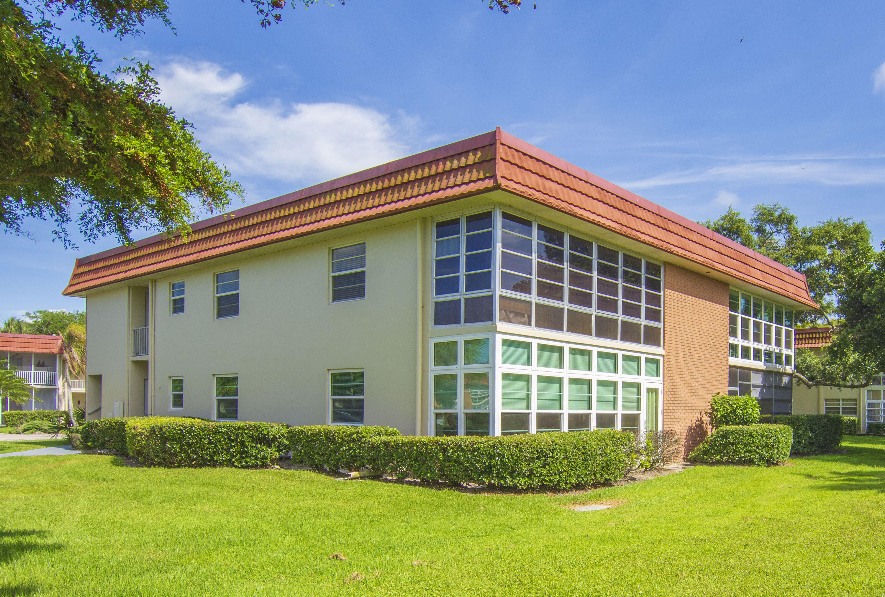 First floor 2/2 condo in the Vista Royale complex an amenity rich resort style 55+ living community just 5 miles to the beach newly renovated three 9-hole Mangrove Sands Golf Course, an on-site restaurant, multiple pools, fitness centers, 4-clubhouses, tennis/pickleball courts, shuffleboard, craft room, workshops, library, and wonderful social activities, cookouts, bingos, dances and community organized excursions. 2023 A/C, fully tiled floors, updated kitchen, newer appliances top condition move in ready.