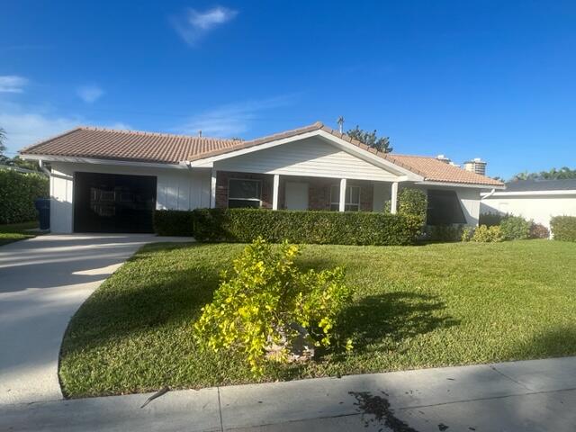 Updated bathrooms just completed tiled floors throughout living area must see to appreciate!! Fantastic location right across from the beach in private Yacht Club Manor. Large private back yard with  open patio and private shower to wash off the sand. Deep one car garage and lots of closet storage in the home. Master has its own bath**Singer Island's location provides easy access to many attractions and activities in Palm Beach County, including shopping, dining, and outdoor recreation. The deeded beach access is a nice bonus, allowing you to spend as much time as you'd like lounging on the sand and enjoying the warm Florida sun.  Whether you're looking for a quiet getaway or an action-packed vacation, Singer Island has something for everyone.