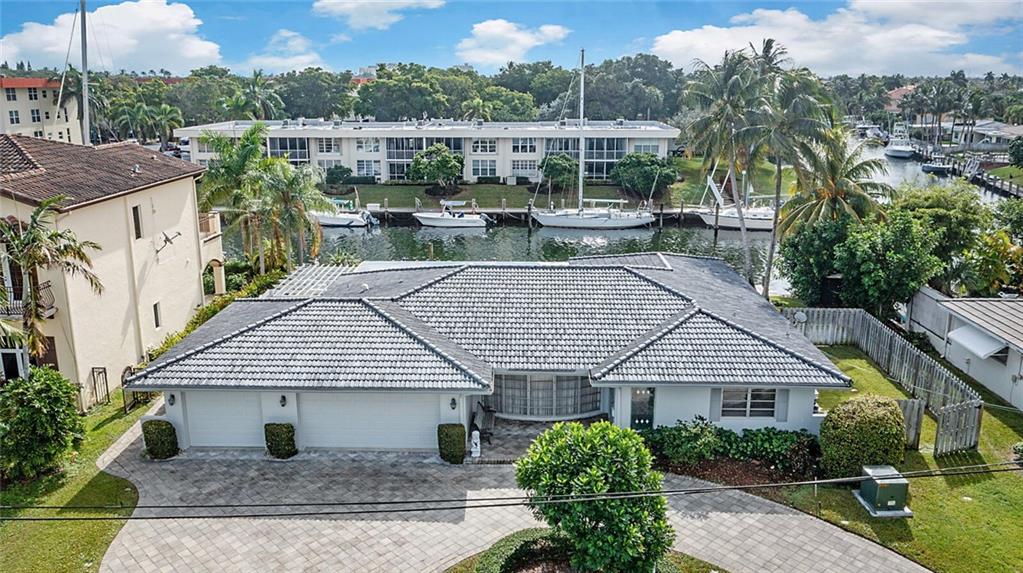 Just four houses from the Intracoastal, this deep-water home sits on a 150-foot wide canal with 100 feet of frontage, feel the ocean breezes to the east.  Definitely bring your large boats!!! South facing three bedroom, two and a half bath property with wonderful open living space and a three car garage. Panoramic water views and character highlight this waterfront property. Tremendous light from all the windows, good size bedrooms and tons of closet space.  A newly redone sparkling pool and spa are a great features along with two side yards that have additional room to expand. Just down the street from DeGroff park located on the Intracoastal in this delightful waterfront community.  This is a perfect home for the avid boater!