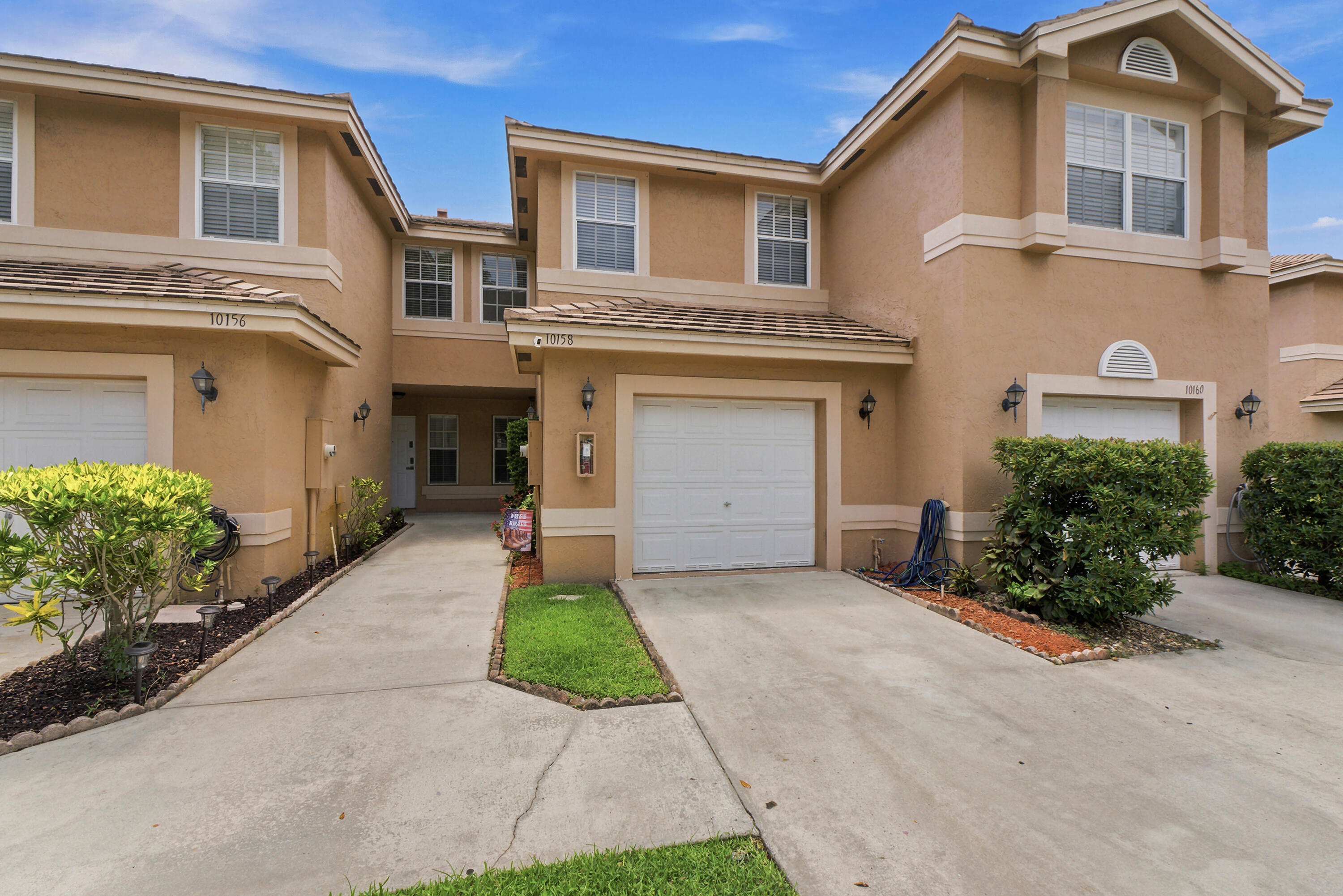 Welcome Home to This Beautifully Maintained and Spacious 3-bedroom, 2.5-Bath Townhouse. Updated Kitchen with Beautiful White Cabinets, Granite Counter Tops, Tile Throughout, Newer Laminate Flooring, Additional Upgrades and More! Upstairs, You'll find Spacious Bedrooms with Walk In Closets and a Full-Size Washer and Dryer. Attached One Car Garage Provides Additional Parking Along with Additional Storage. Relax on Your Private Patio with Scenic Canal Views and Beautiful Trees Providing a Peaceful Setting to Enjoy All Year Round. Easy to Show!